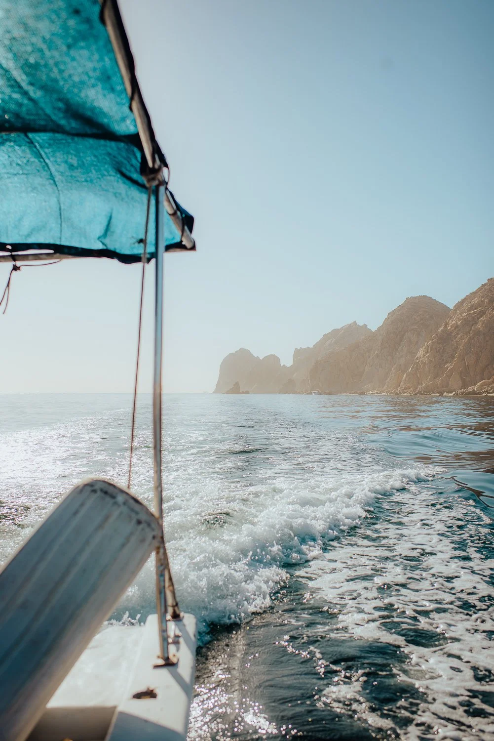 Travel photography of the unique rock formations from a taxi boat in Cabo San Lucas, Mexico
