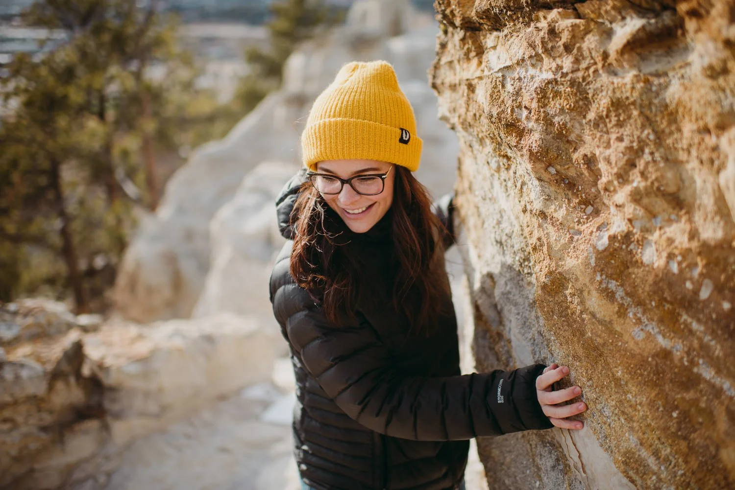 Lifestyle photography of young girl wearing a bright yellow beanie in Colorado Springs, Colorado for Akinz Boardwear