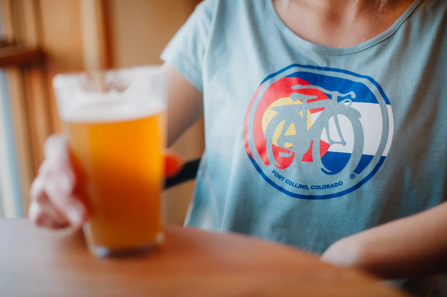 Brand Photography of New Belgium Brewing Company - lifestyle portrait beer colorado flag tshirt