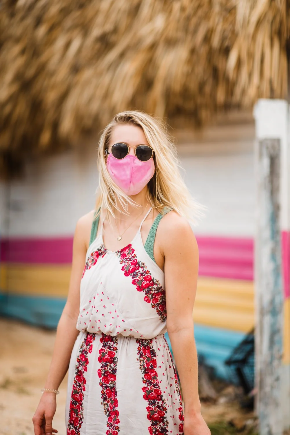 Professional product & branding photography for Sea'sons official face masks - lifestyle portrait with pink mask in Isla Holbox, Mexico.