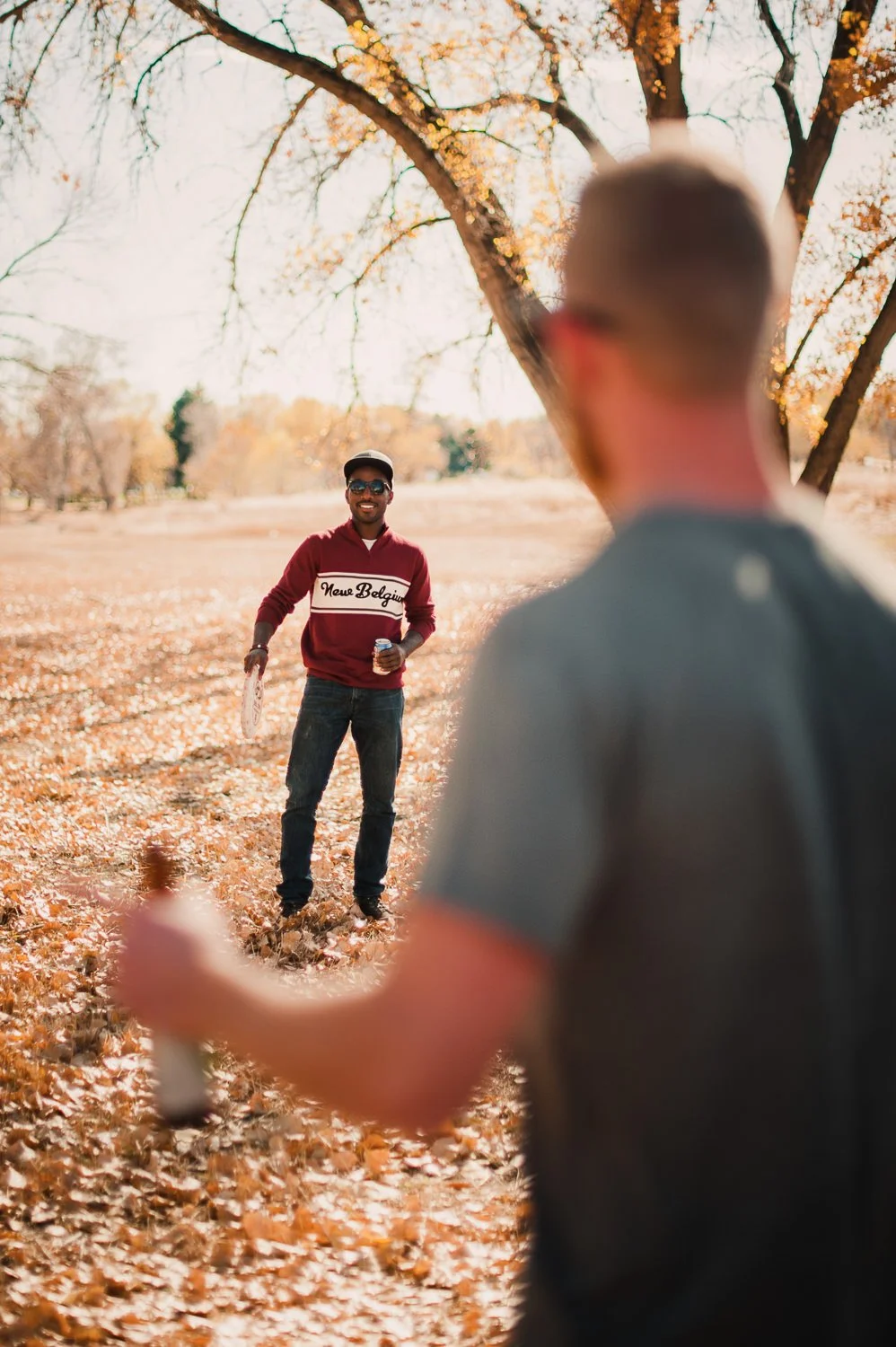 Brand Photography of New Belgium Brewing Company - lifestyle portrait fall sweater and leaves