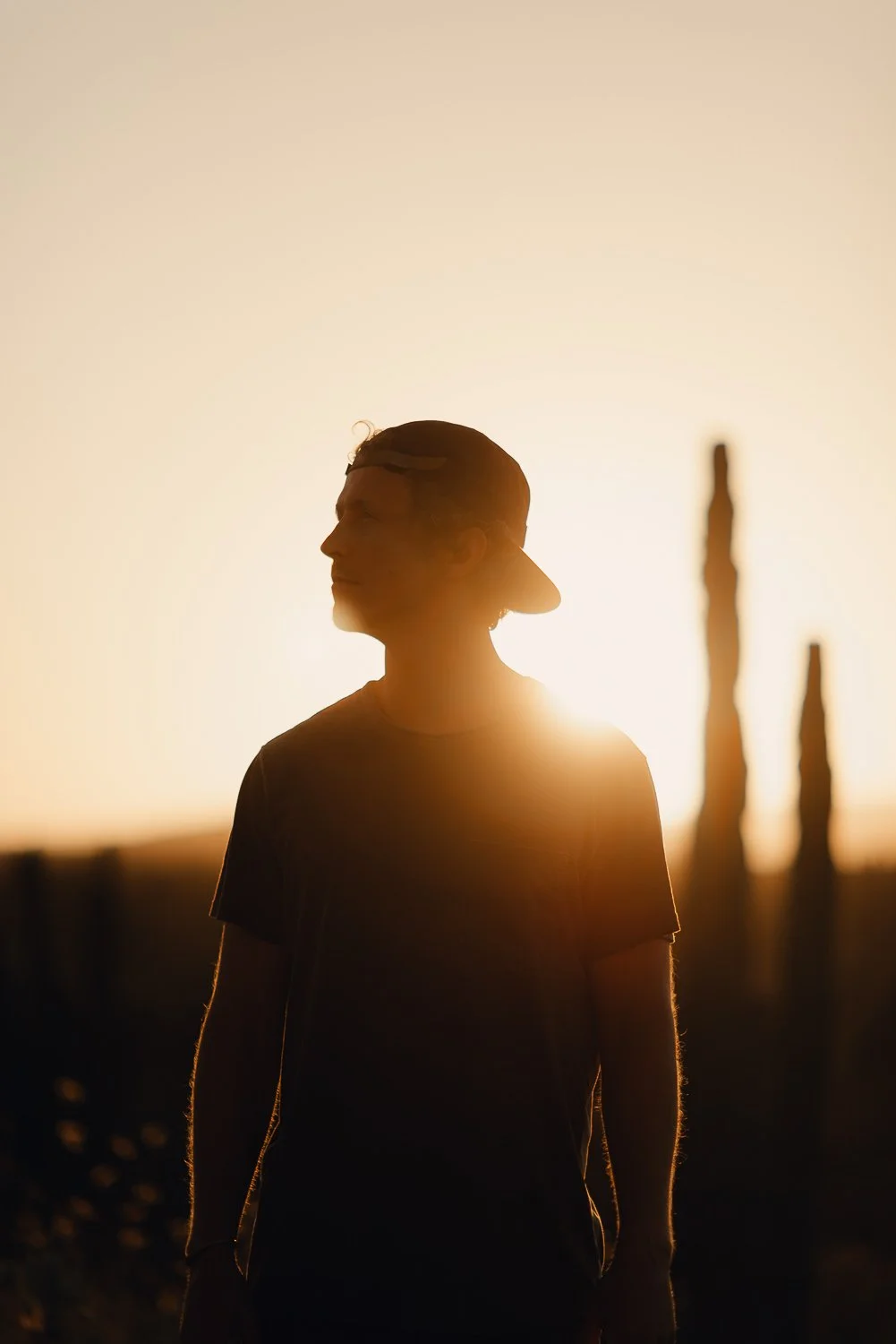 Ryan-Waneka-Photography-2022-La-Paz-Mexico-39-backwards-hat-silhouette-golden-hour.jpg