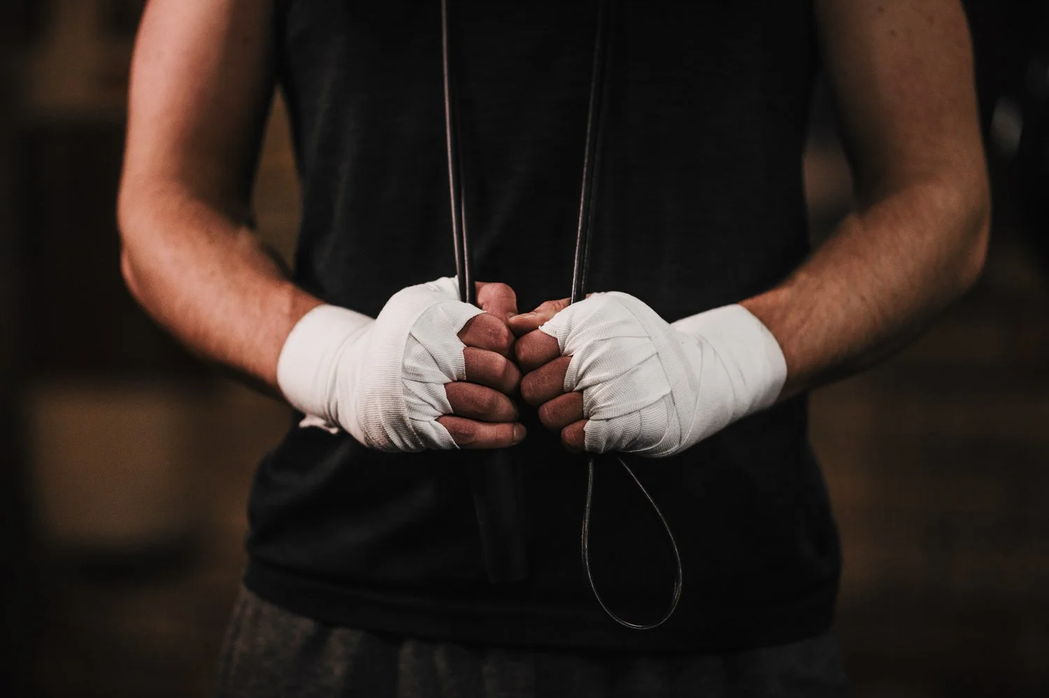 Close up lifestyle branding image of handwraps at Beautifully Savage boutique boxing gym in Fort Collins, Colorado