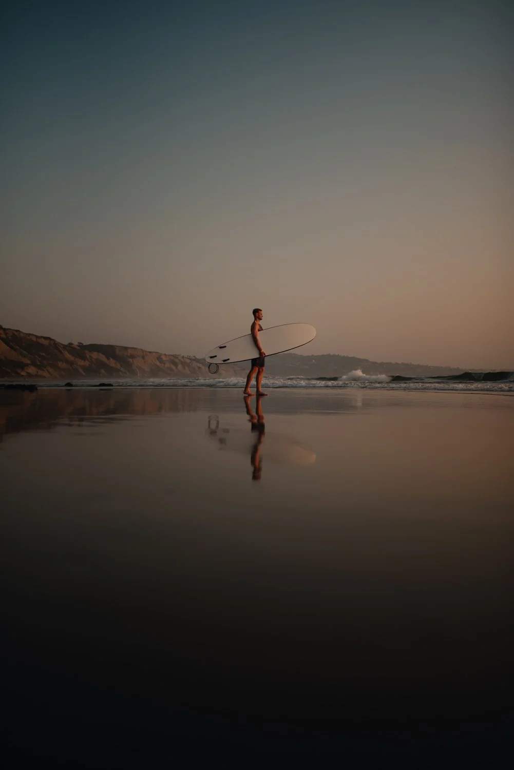 Professional adventure photography in San Diego, California - surfing portrait near blacks beach
