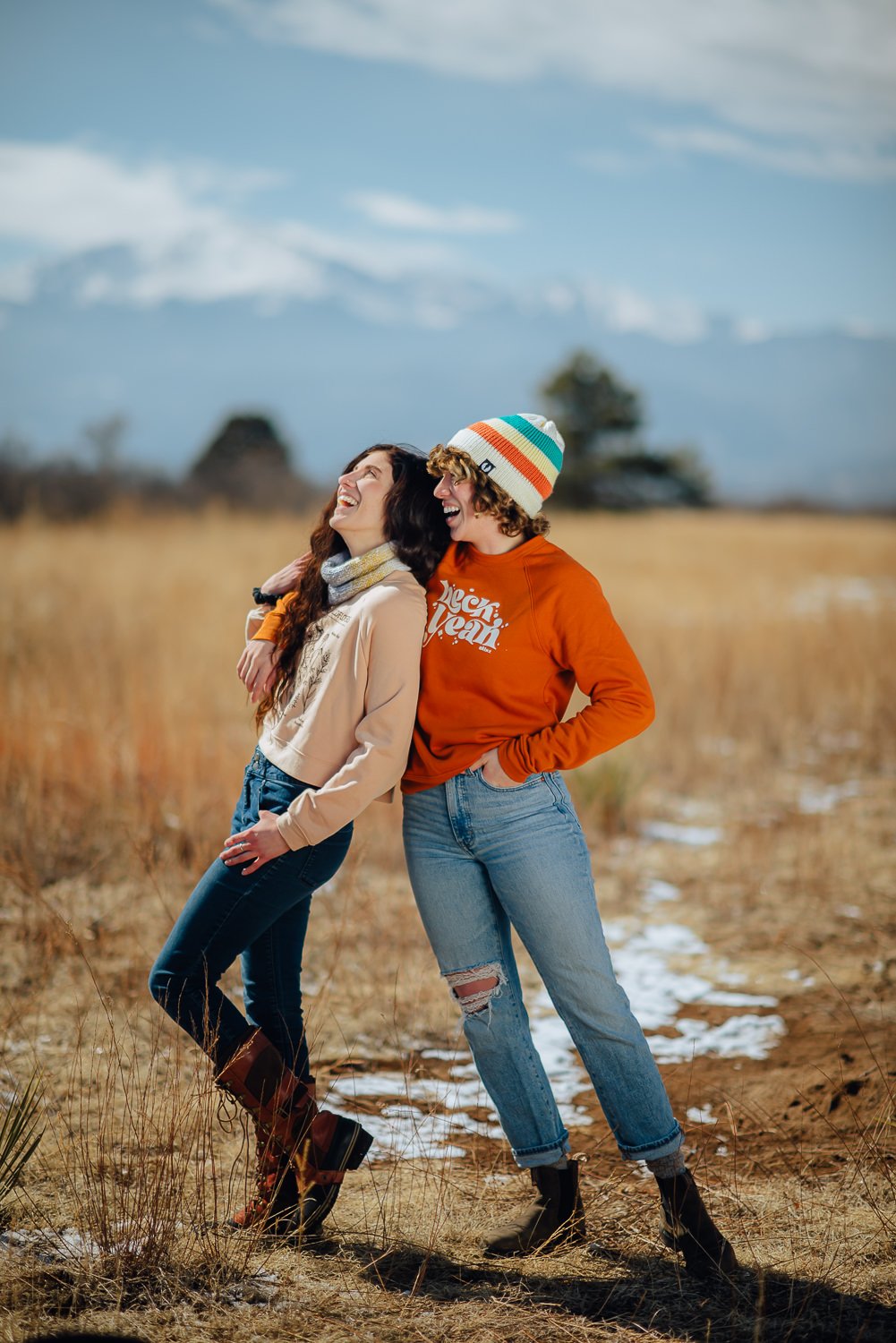 Lifestyle photography of two college aged girls wearing Akinz crewneck sweaters at Palmer Park in Colorado Springs, Colorado for Akinz Boardwear