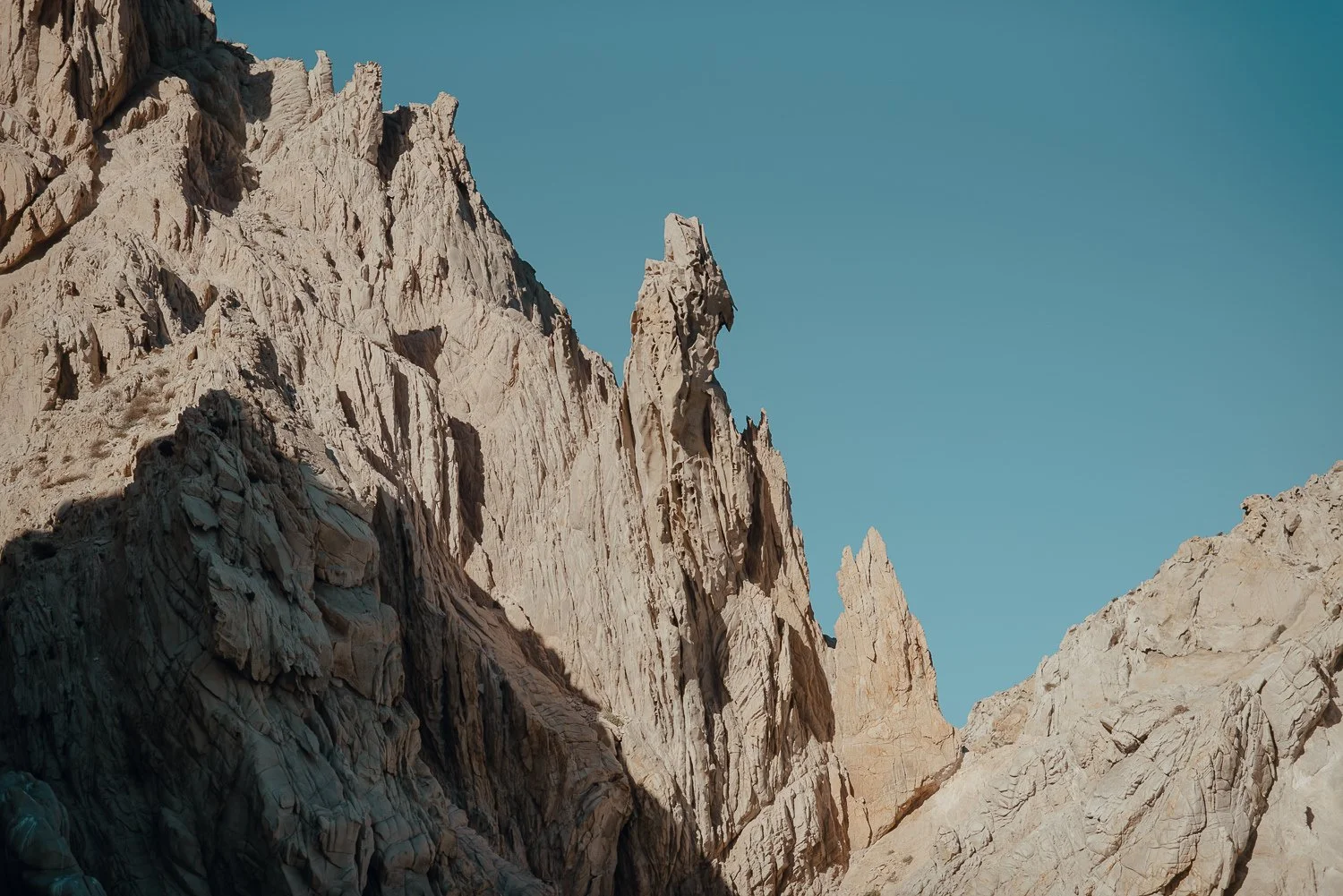 Landscape photography of the famous arch and unique rock formations at Lover's Beach in Cabo San Lucas, Mexico