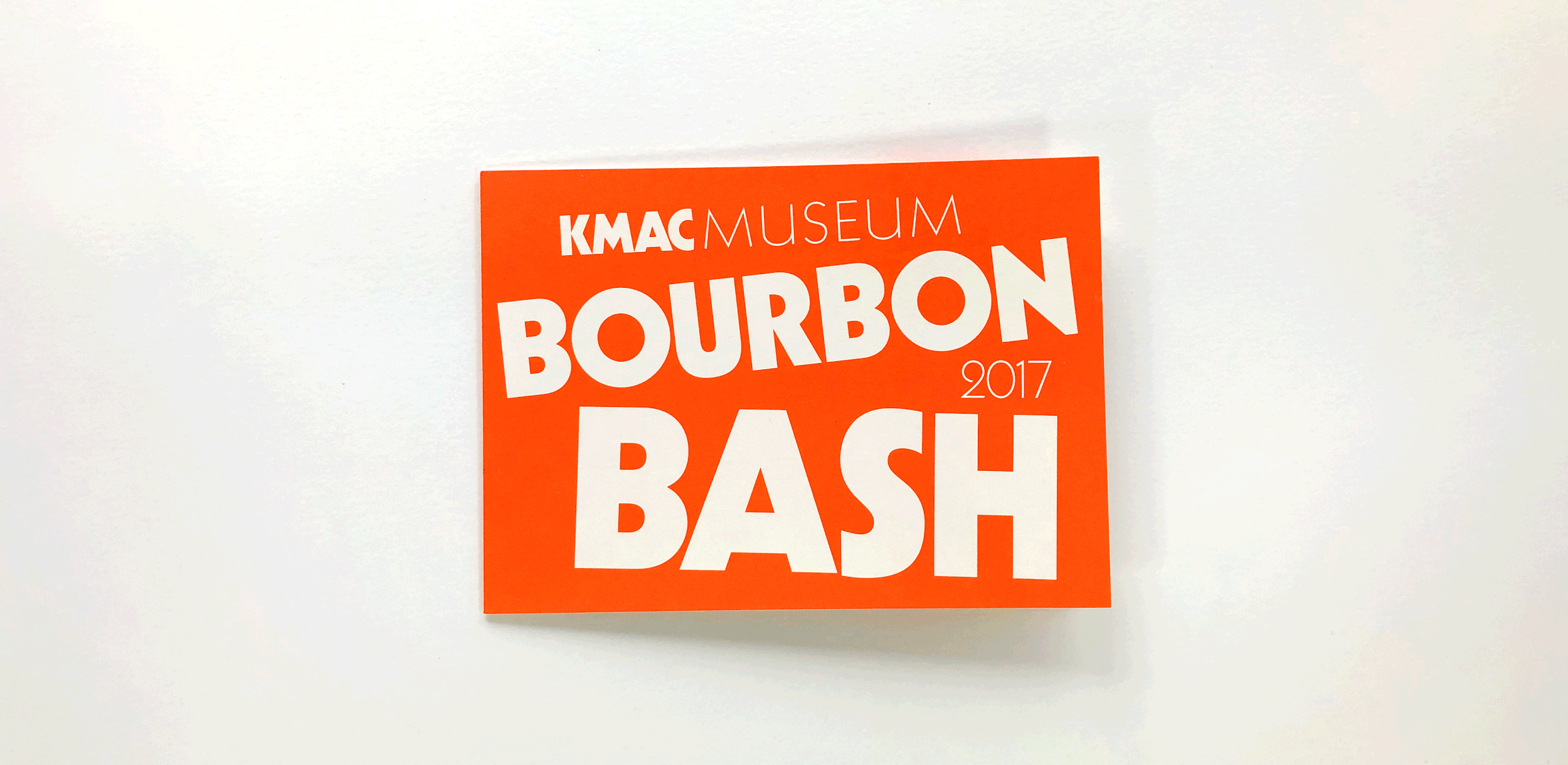 unfolding the KMAC Bourbon Bash invite