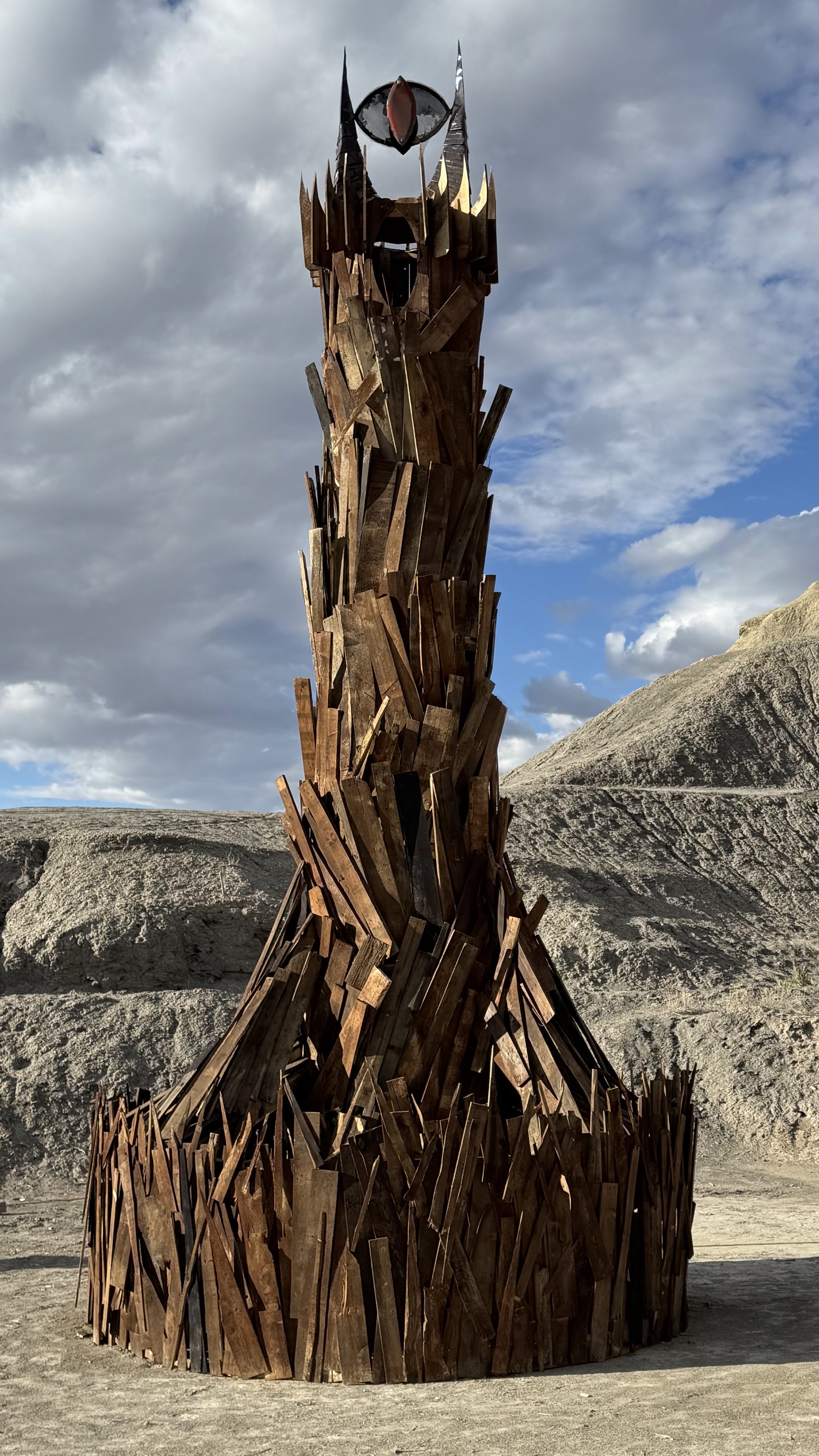 The Tower of Barad Dur, built for the 11th edition of our annual Halloween party, DDP. 

Shown here in the daytime with the beautiful BLM lands of Green River in the background.  

Conceptualized and fabricated with Thom Allen, built on-site with man