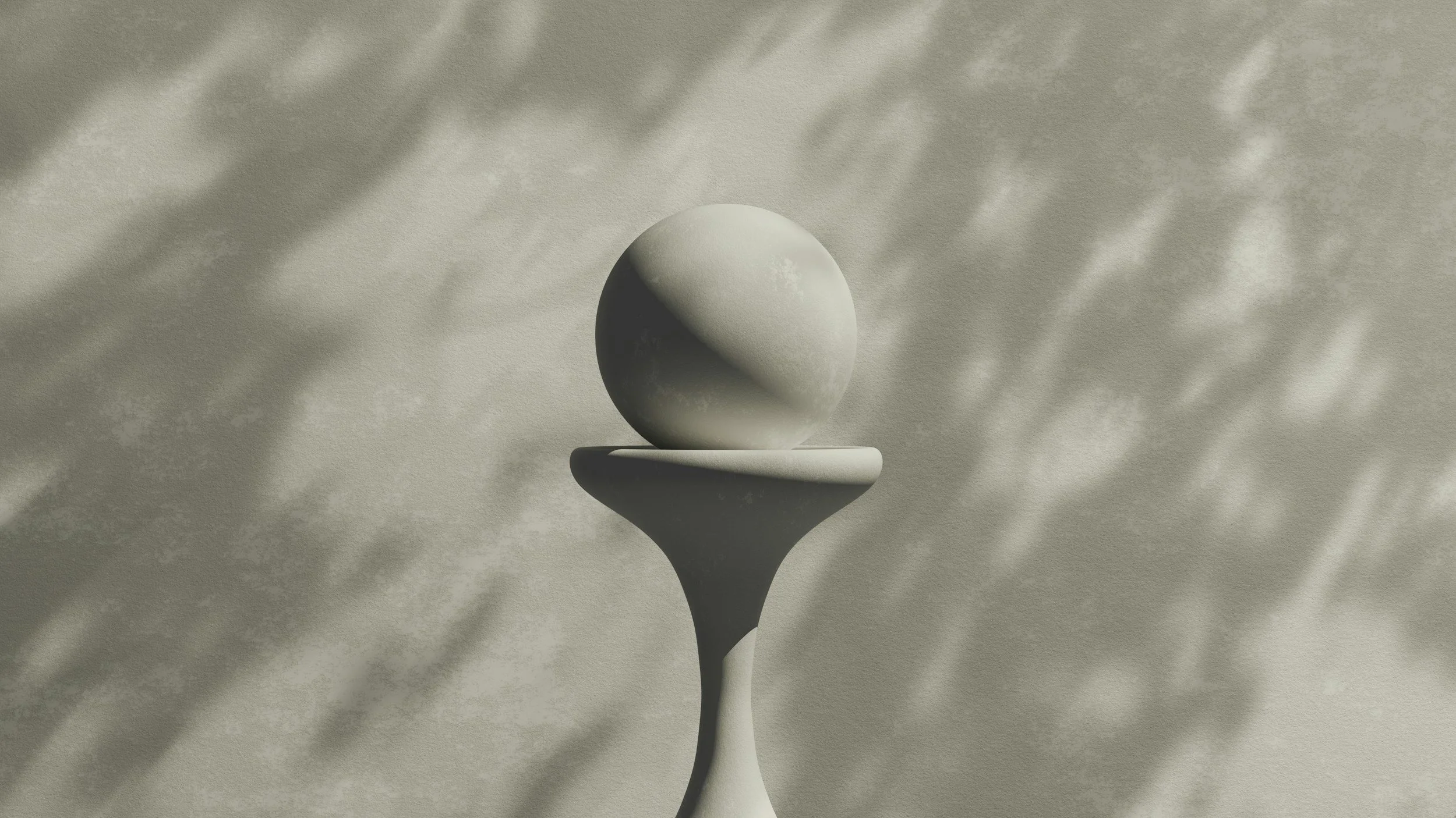 A monochrome sculpture of a sphere balanced on a pedestal, with shadows cast across a textured surface.