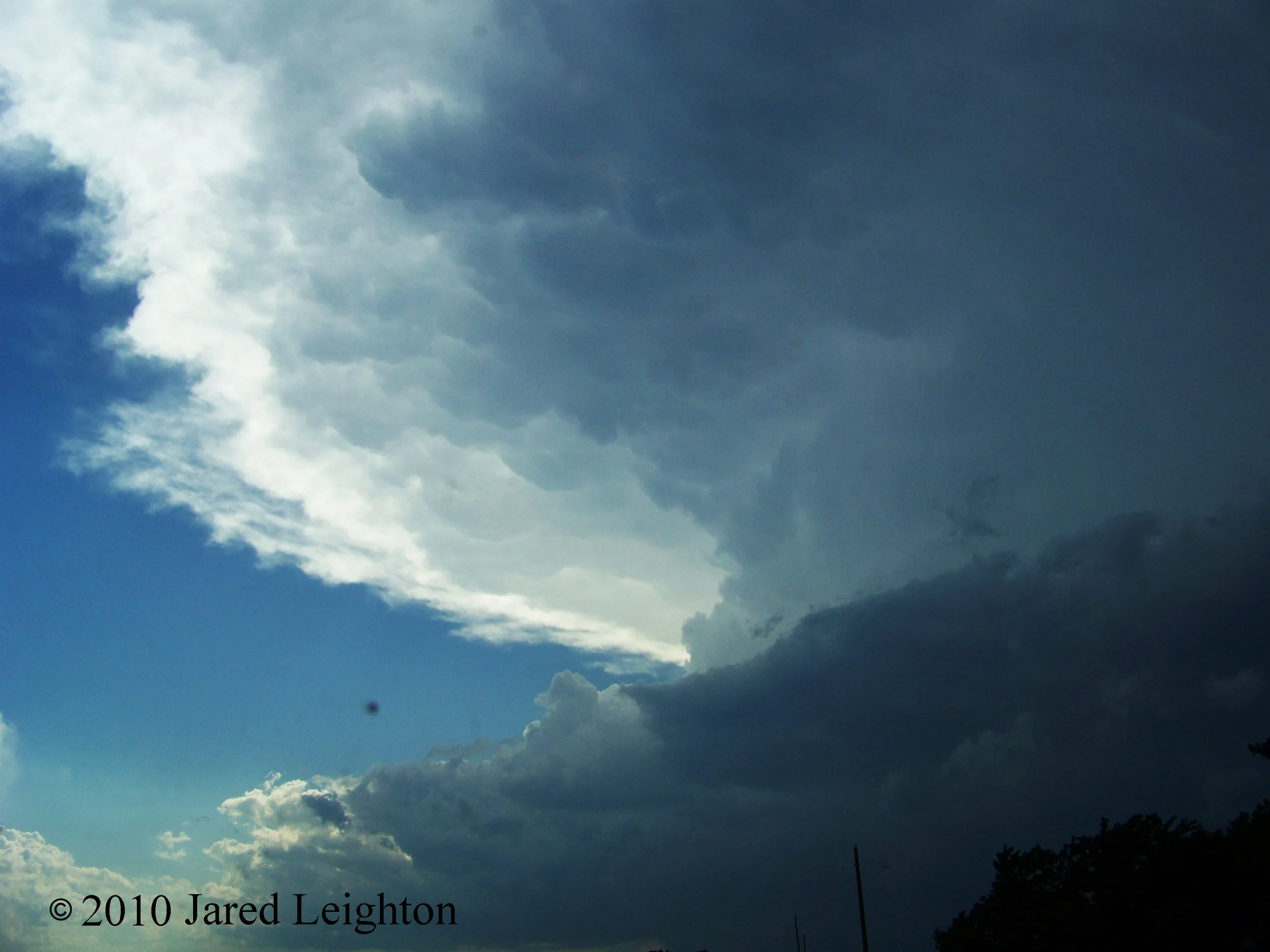 The front flank of the supercell which spawned tornadoes in northwest Oklahoma, along Hwy 33
