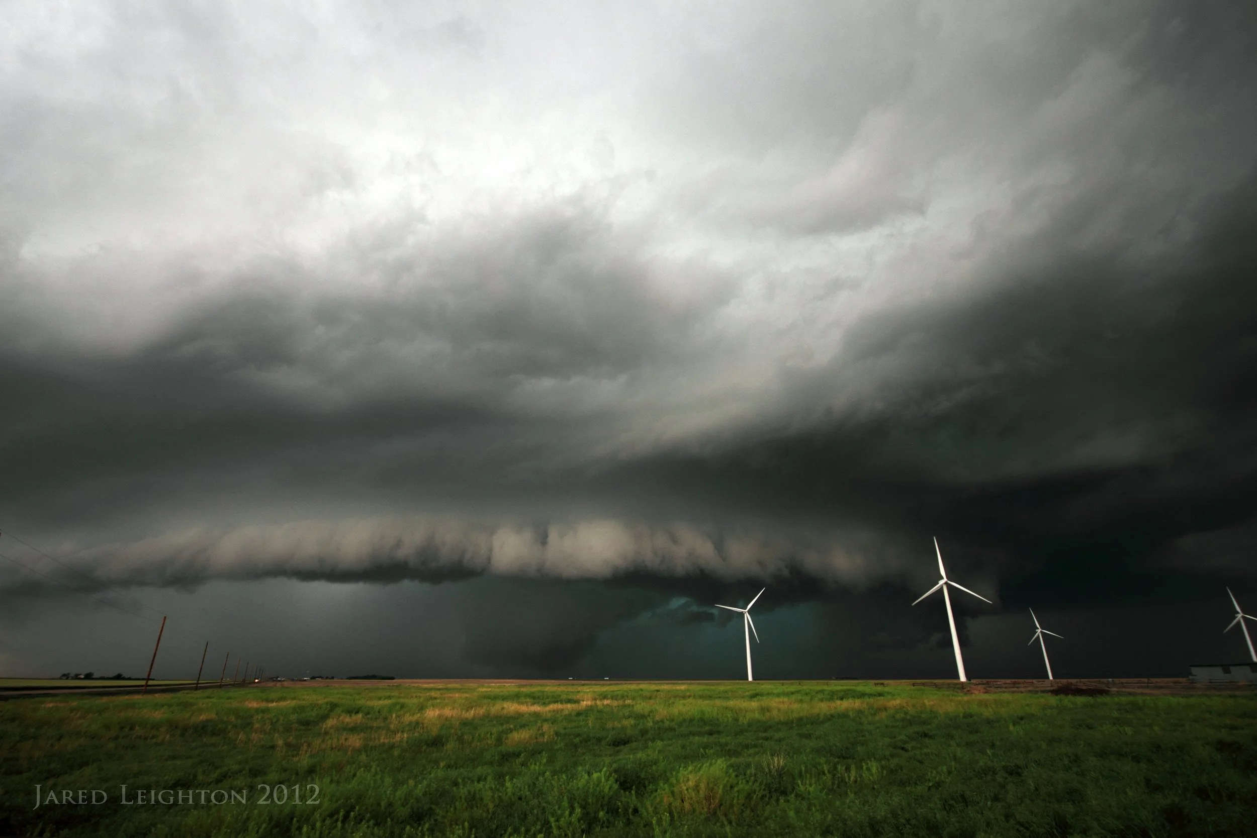 This supercell produced an RFD shelf over a windmill farm near Dodge City, Kansas