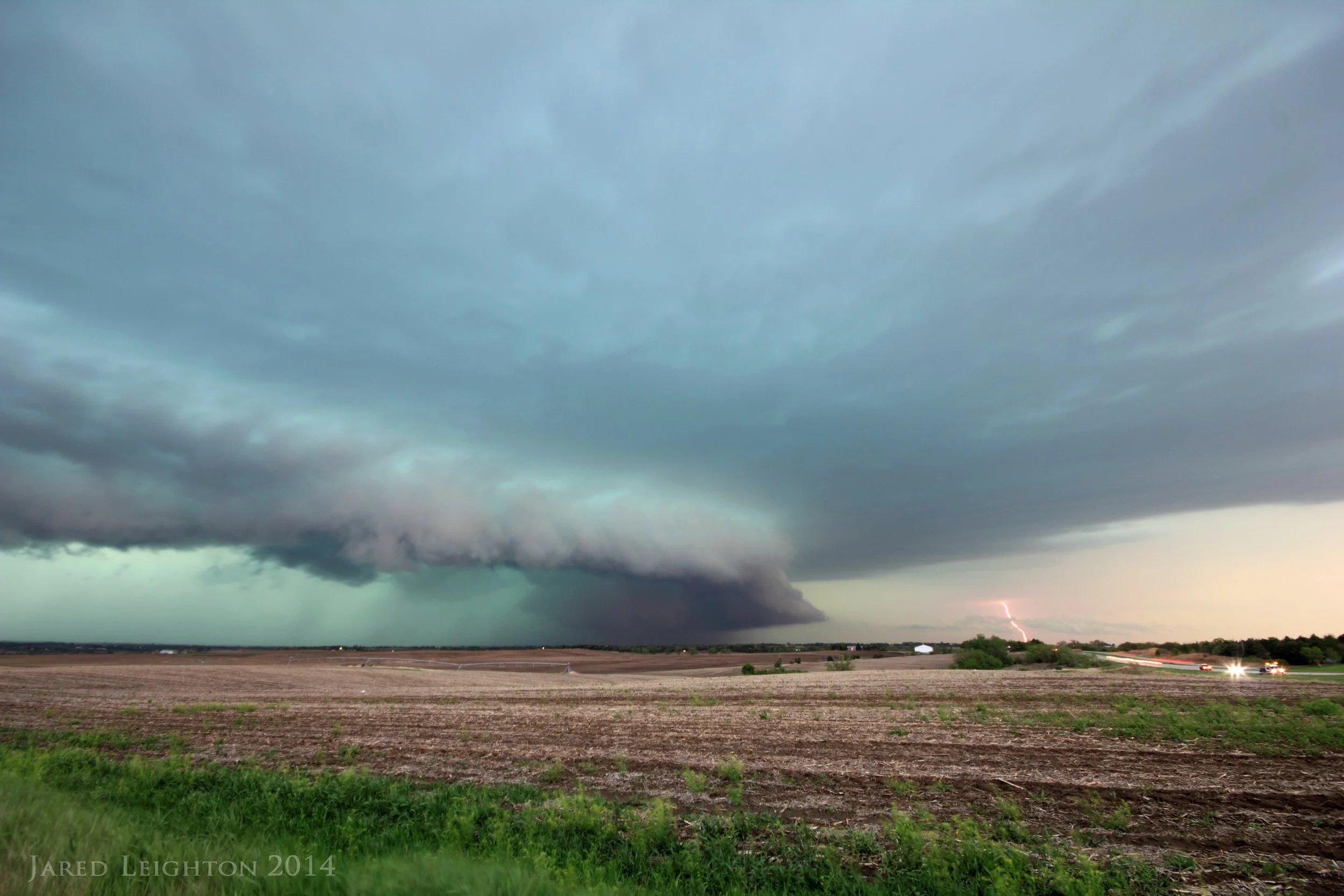 A shelf cloud races east along the southern flank of the storm, just north of Lincoln, Nebraska
