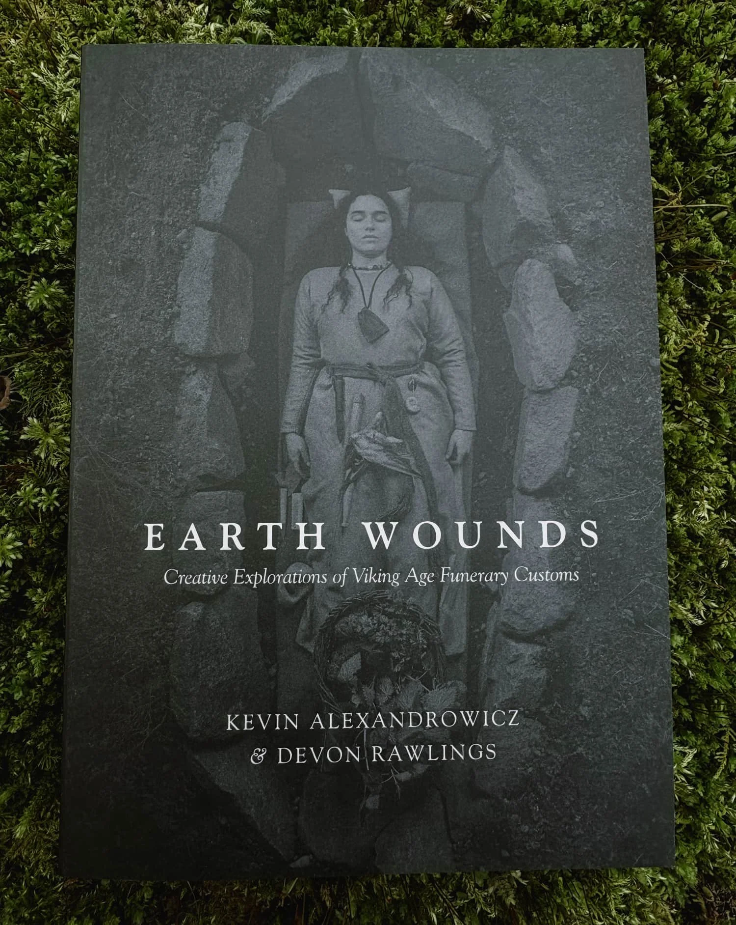 Photograph of cover of "Earth Wounds"