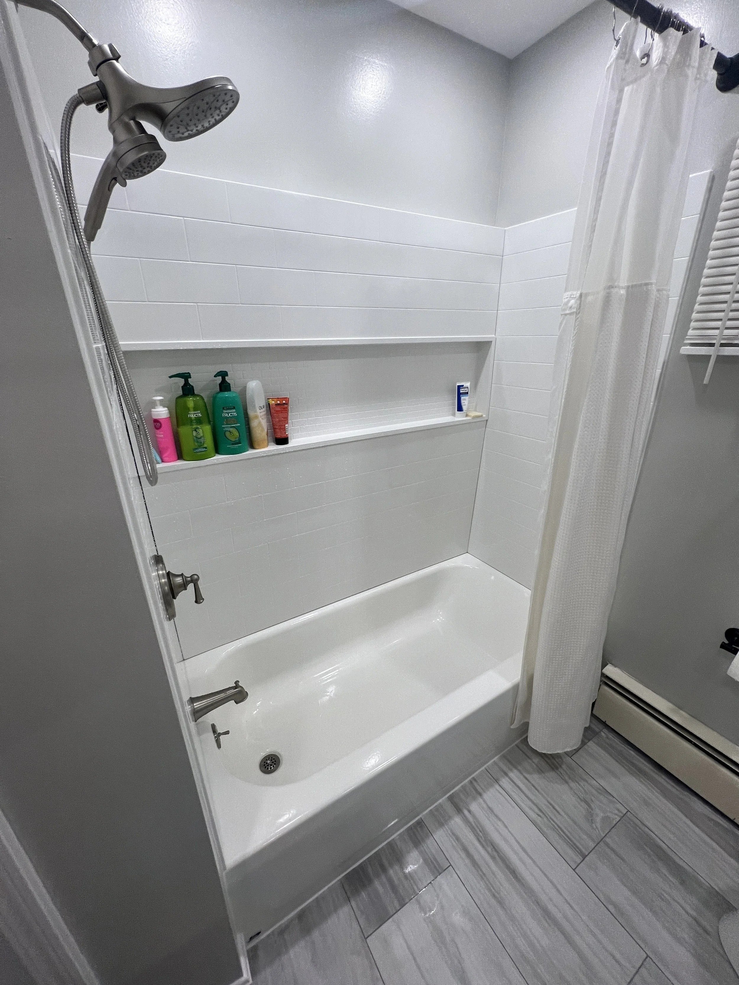 Basement bathroom tub with shower surround, Belle Vernon PA