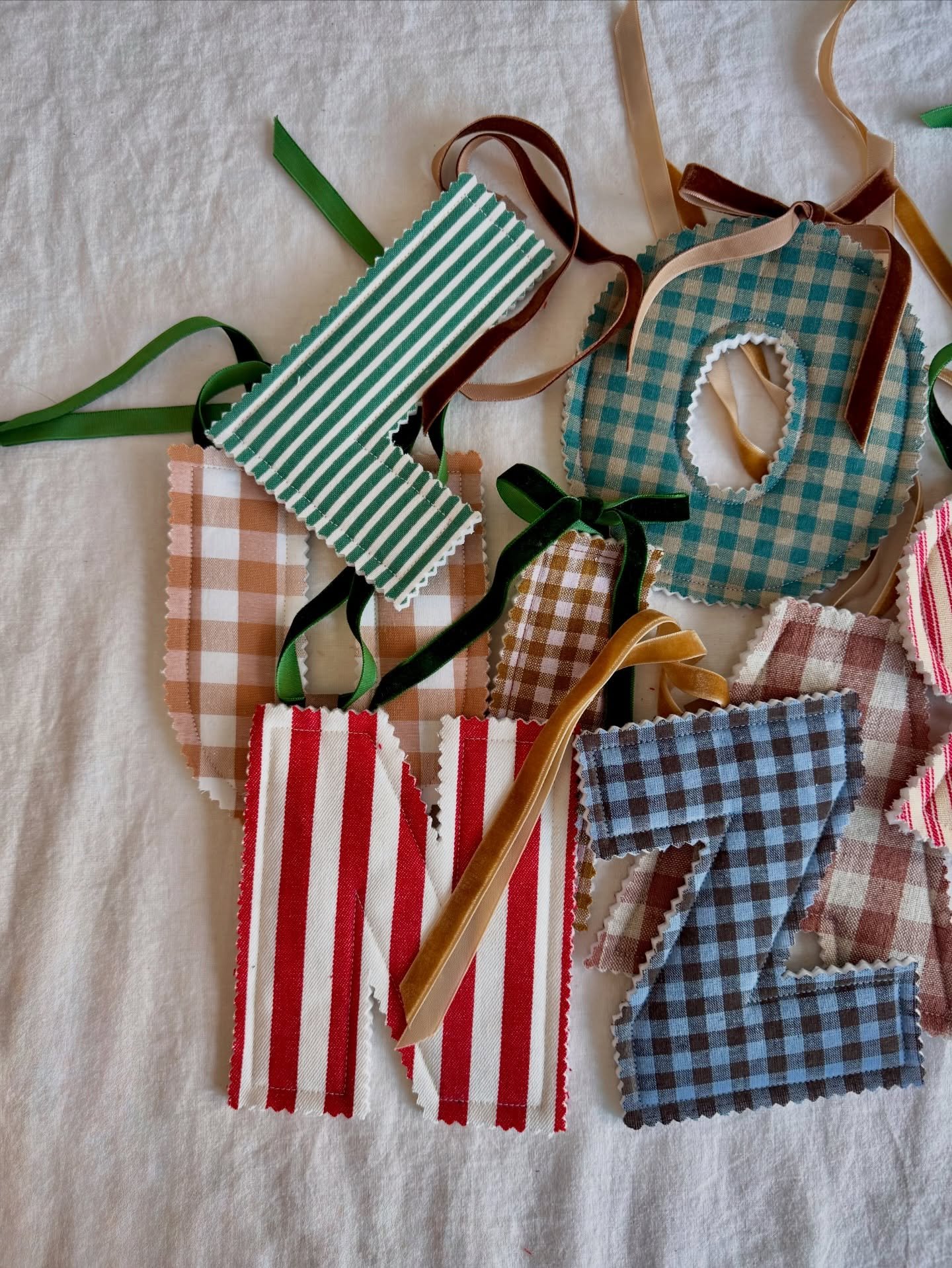 Snippets of our personalised handmade letters which launch online tomorrow at 8pm! 

Each comes with velvet ribbon to hang as individual letters or as a name garland 🎀

#handmadeornaments #handmadechristmas #handmadedecorations #personalisedgift #nu