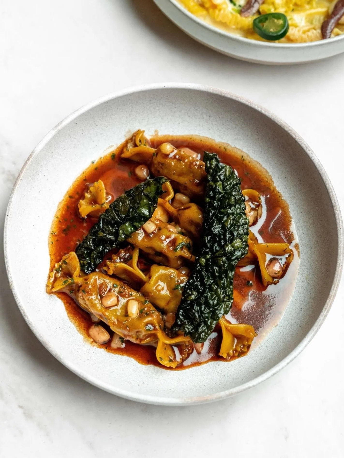 NEW DISH
Rare breed beef caramelle, marrowbone, crispy cavolo nero, Barolo.