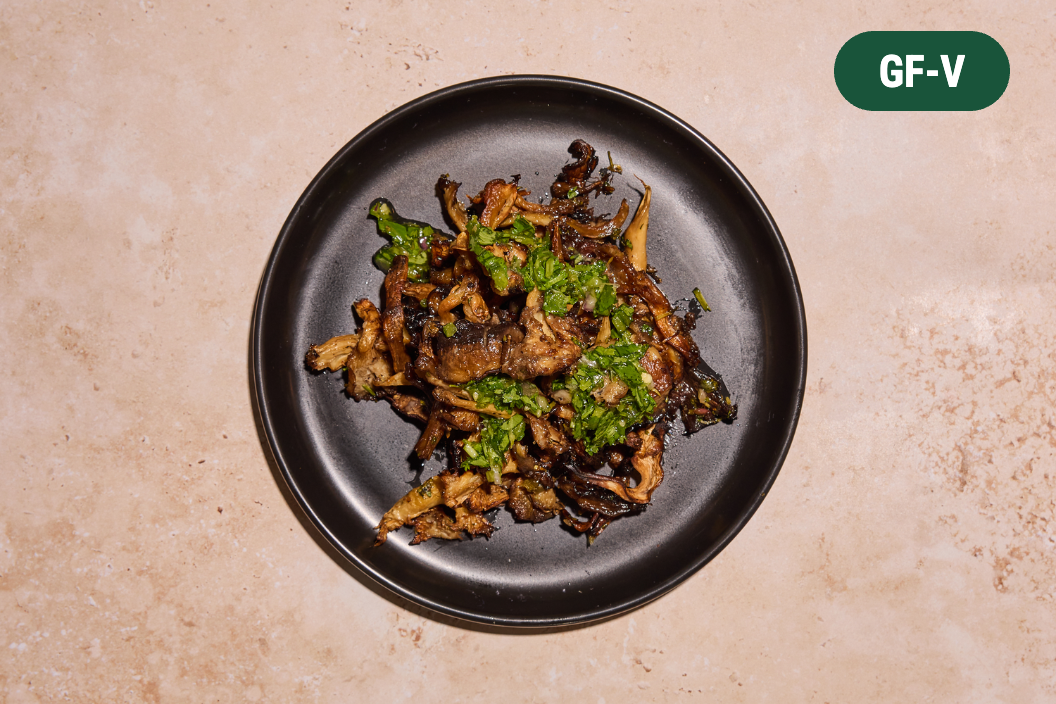 Blue oyster mushrooms topped with housemade chimichurri.