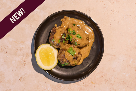 Grass-fed meatballs made with 100% grass-fed beef, made from scratch and topped with gravy.
