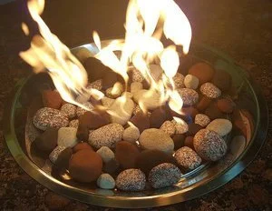 Mixed Fire Stones used as a base layer in a fire pit table