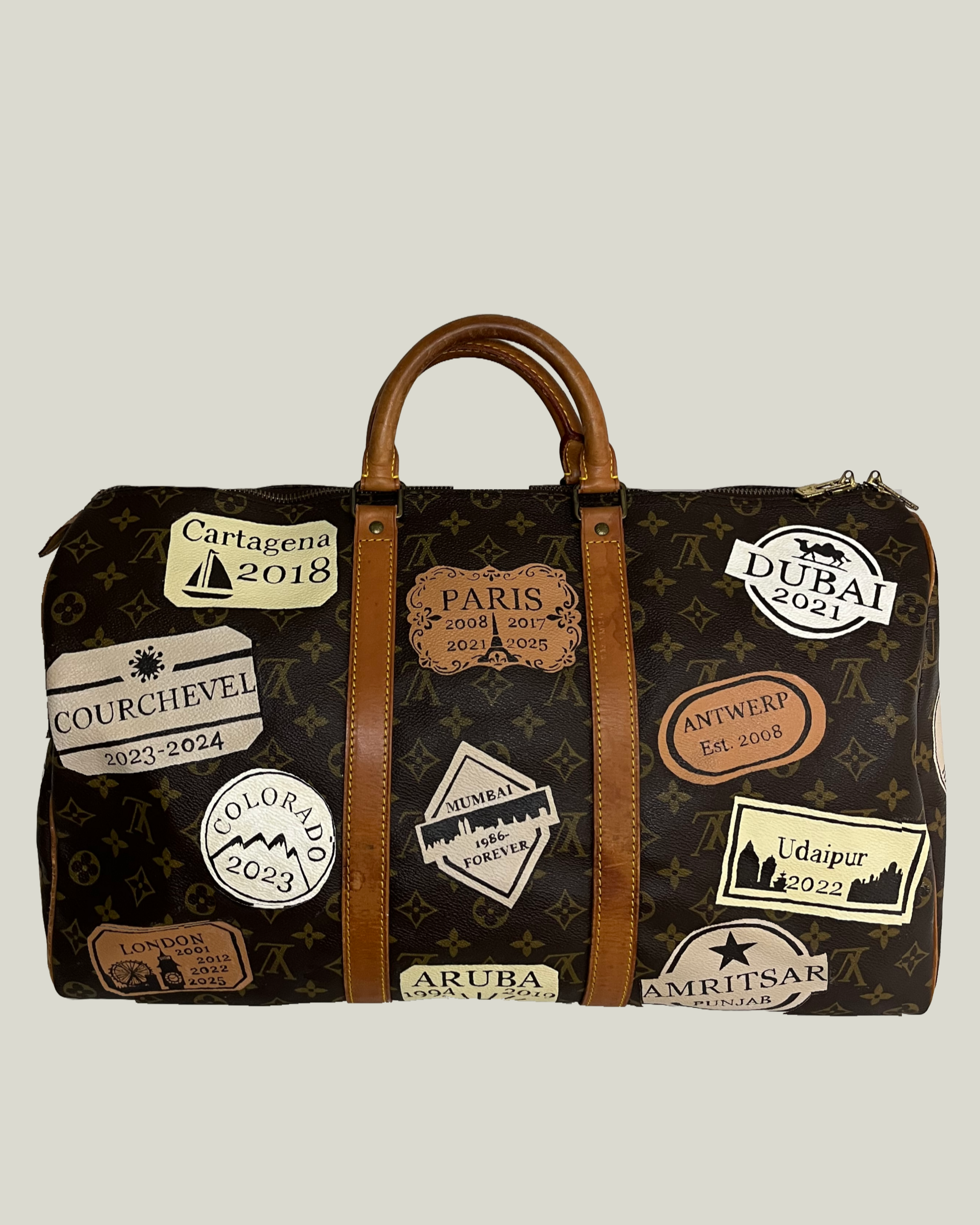Passport Stamps on my client's LV duffel