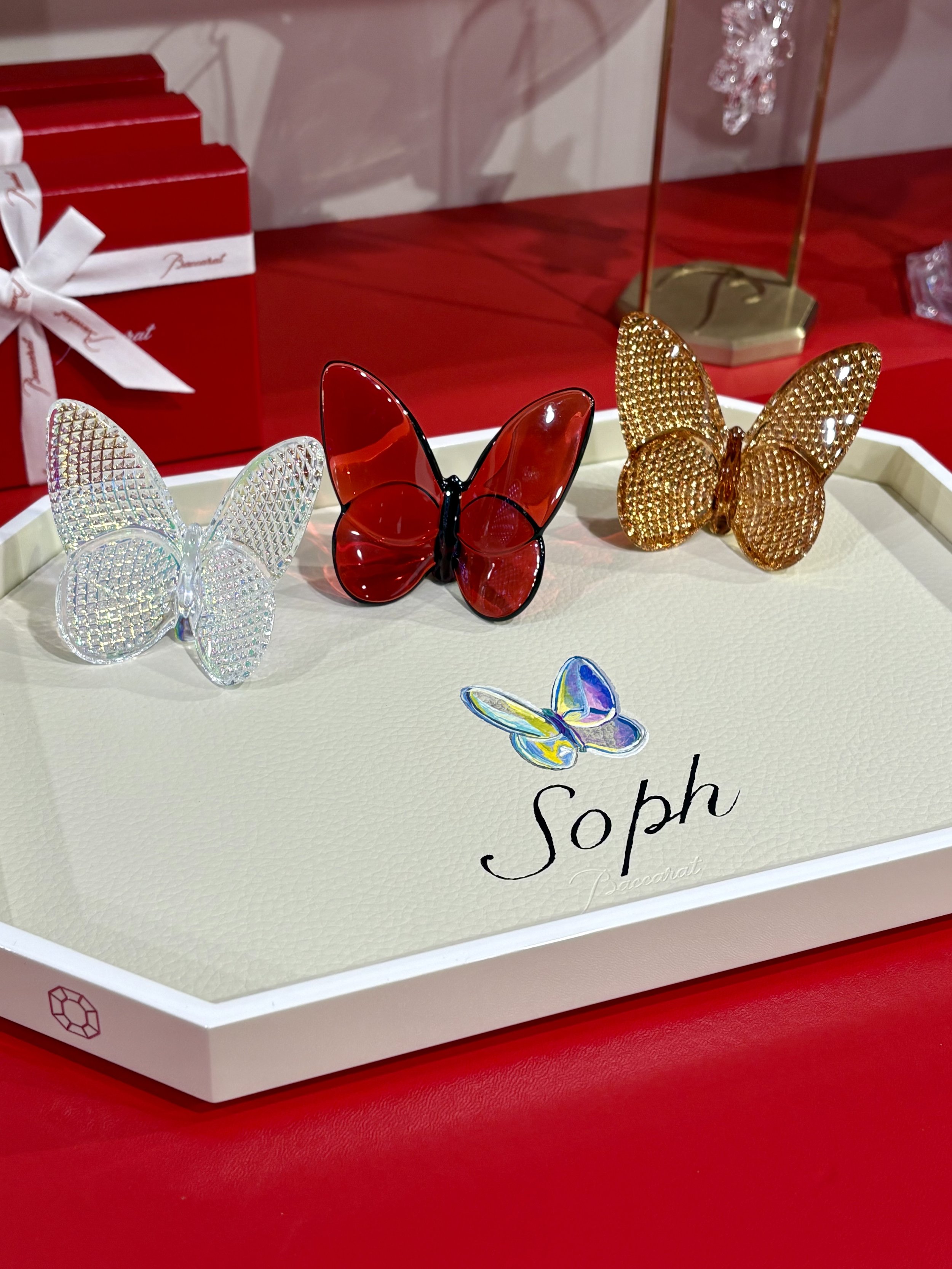 Hand-painted customization for Baccarat. The first time the brand partnered with an artist in the US. Michele Sobel Fine art painted coaster sets, luxury trays and crystal gift boxes with bespoke designs, monograms and brand-inspired art for a succes