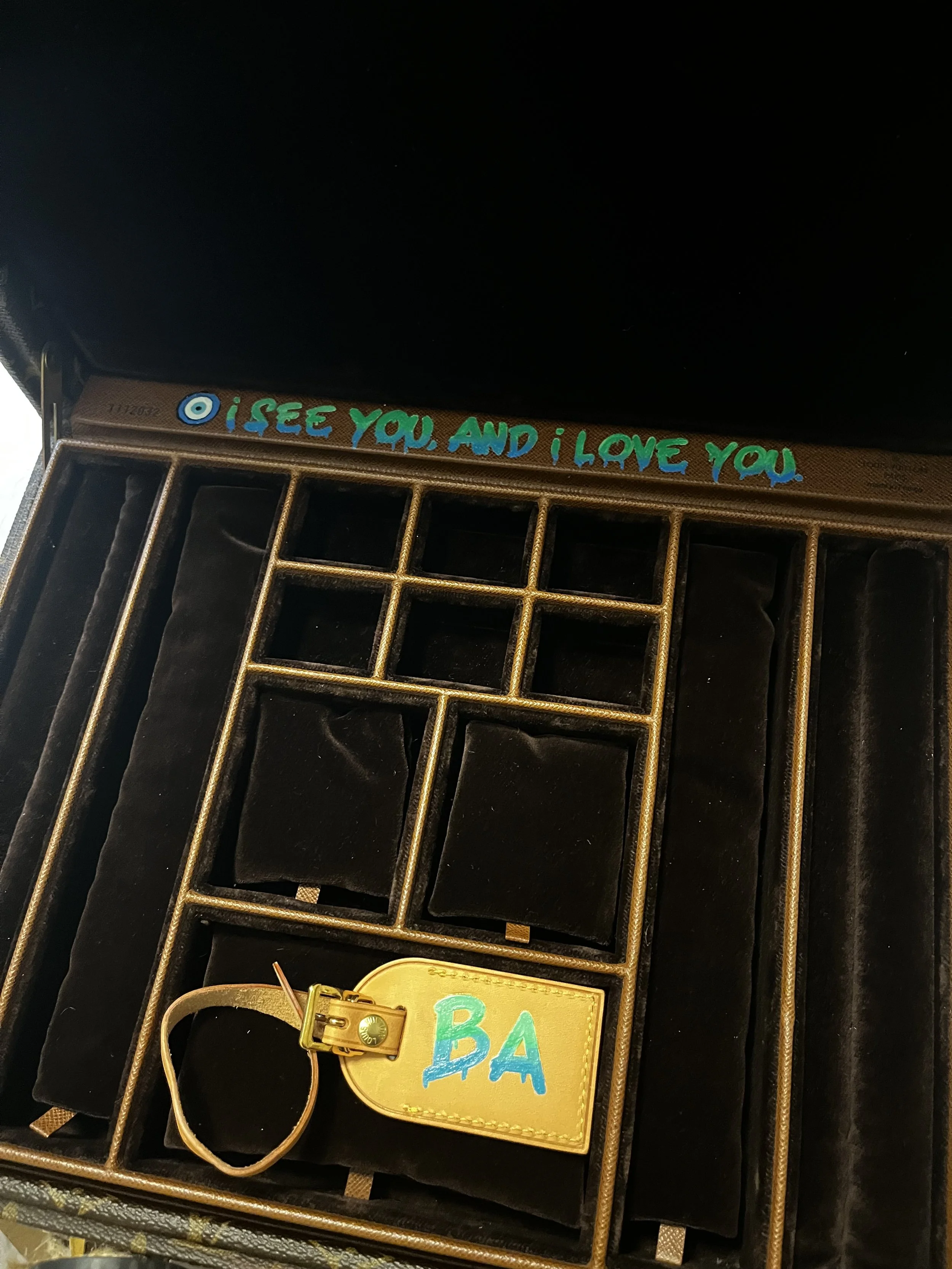 A special gift painted for him on an LV trunk.