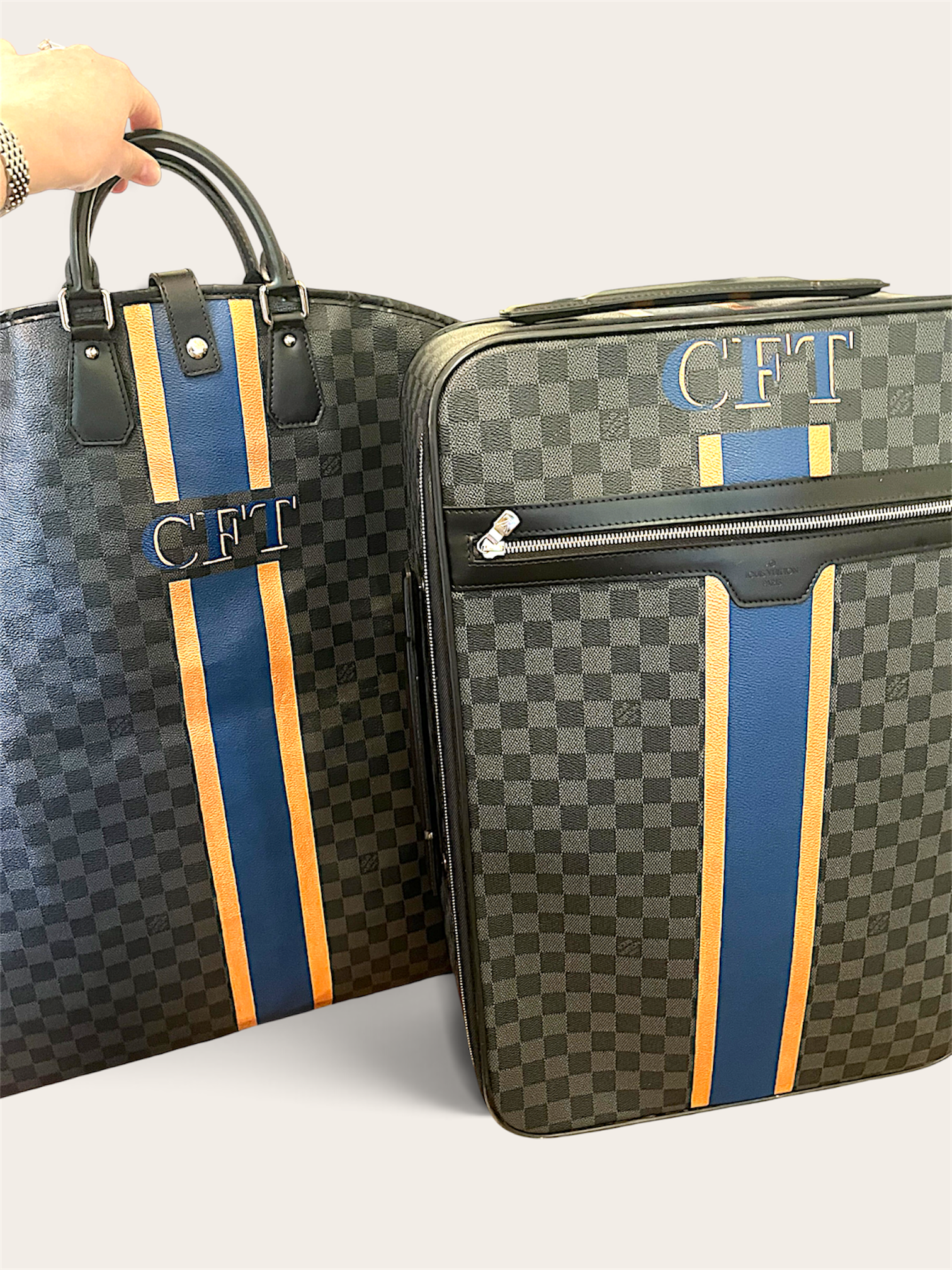 A fresh monogram and stripe treatment for this financial executive's luggage set by Michele Sobel Fine Art