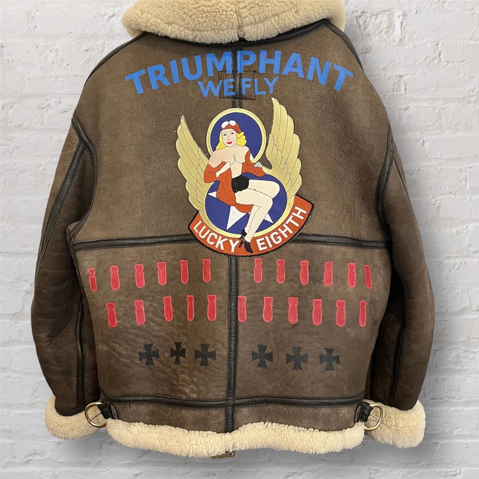 Bomber jacket painted in memory of the family's hero who served in World War II.
