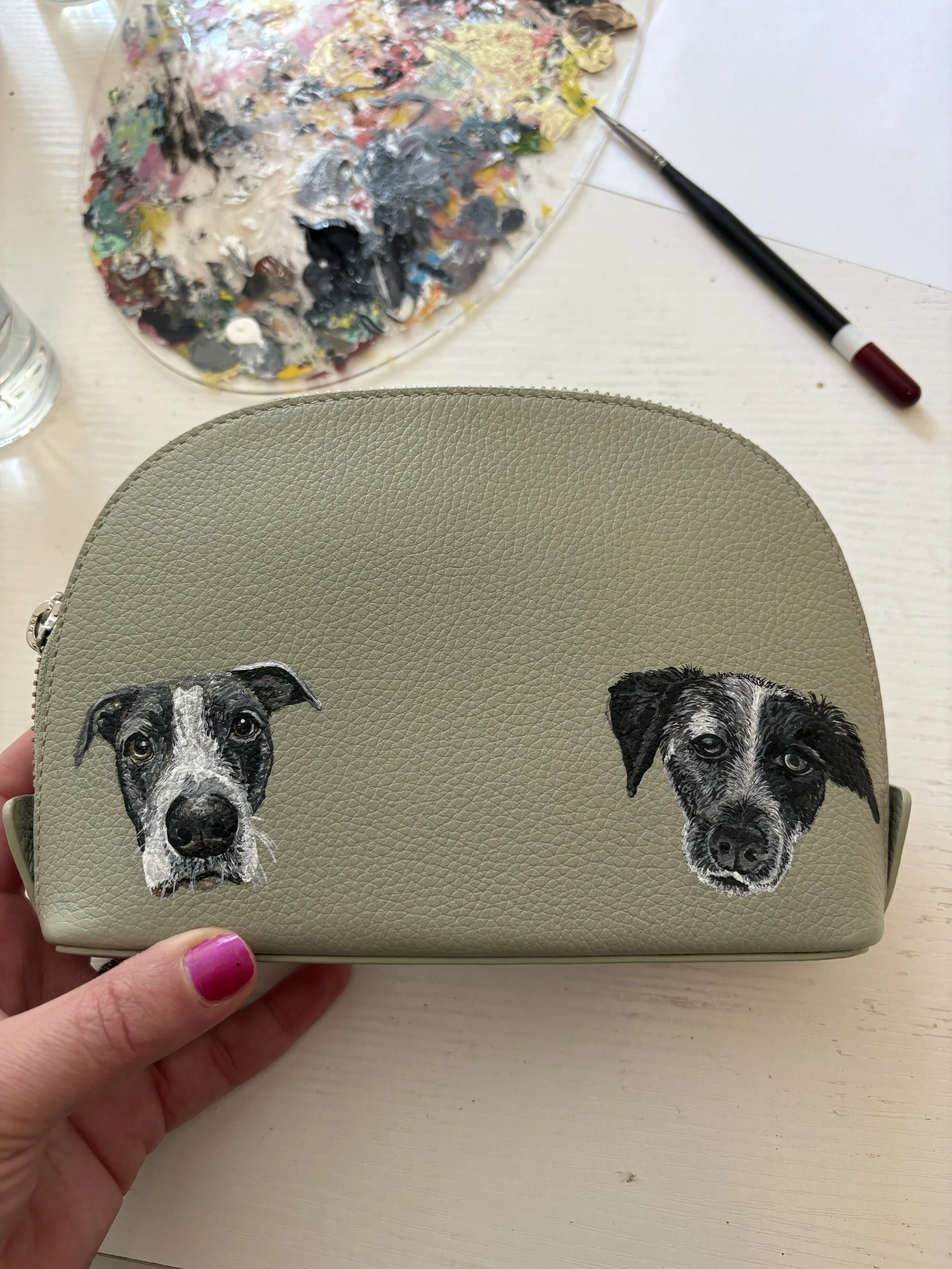 A gift for a pet mom and dad, their two pups painted on a Royce New York makeup case by Michele Sobel Fine Art. 