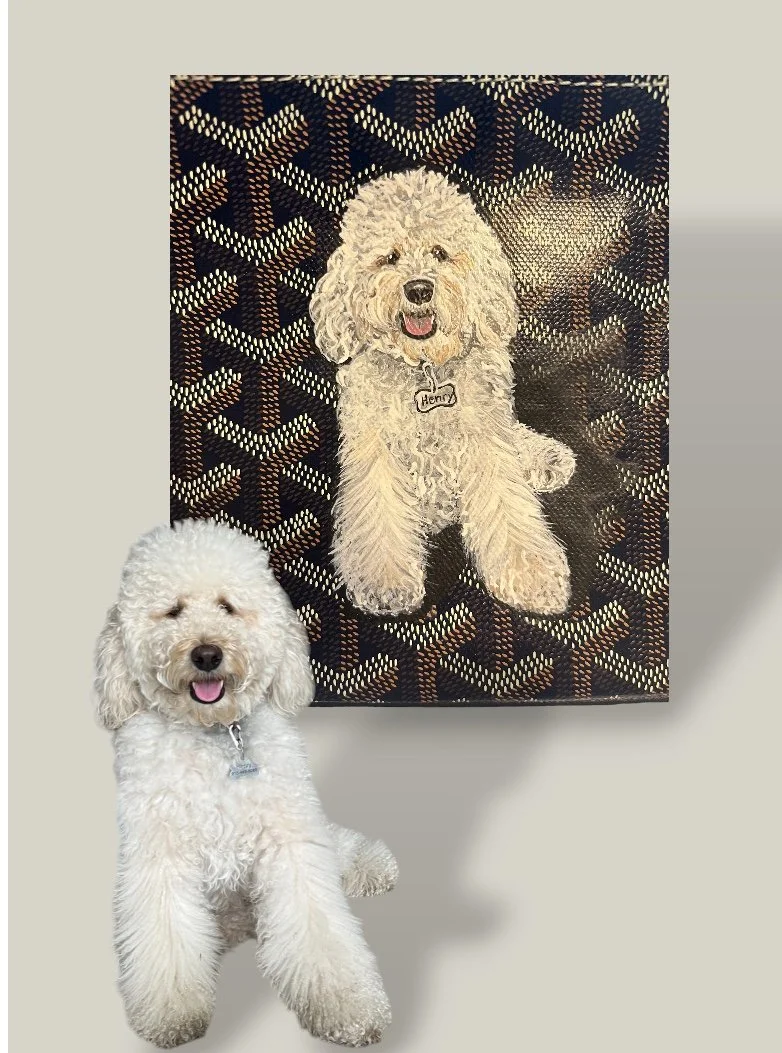 The family dog painted on a Goyard makeup pouch by Michele Sobel Fine Art