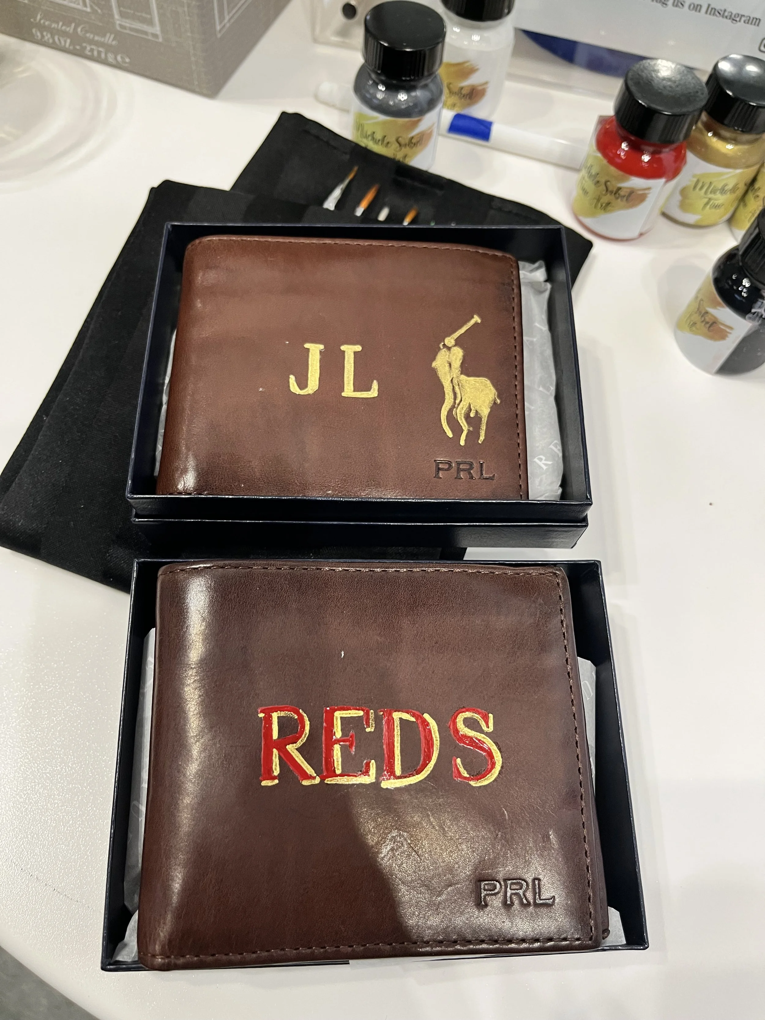 Trade Show gifting for Ralph Lauren. Custom painted wallets by Michele Sobel Fine Art