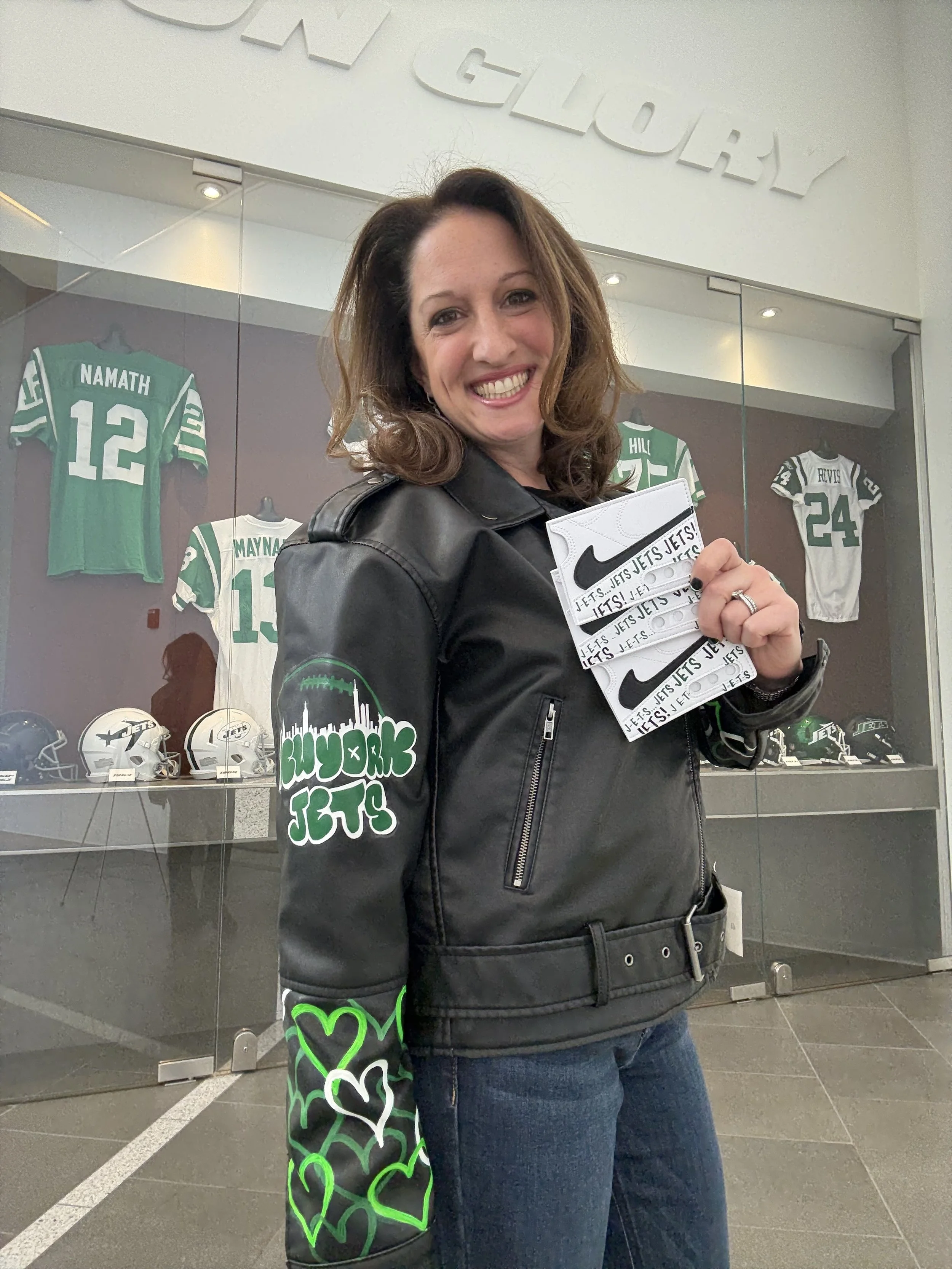 Jacket Michele Sobel Fine Art painted to paint on-site at the Jets training facility for a live customization event for New York Jets!