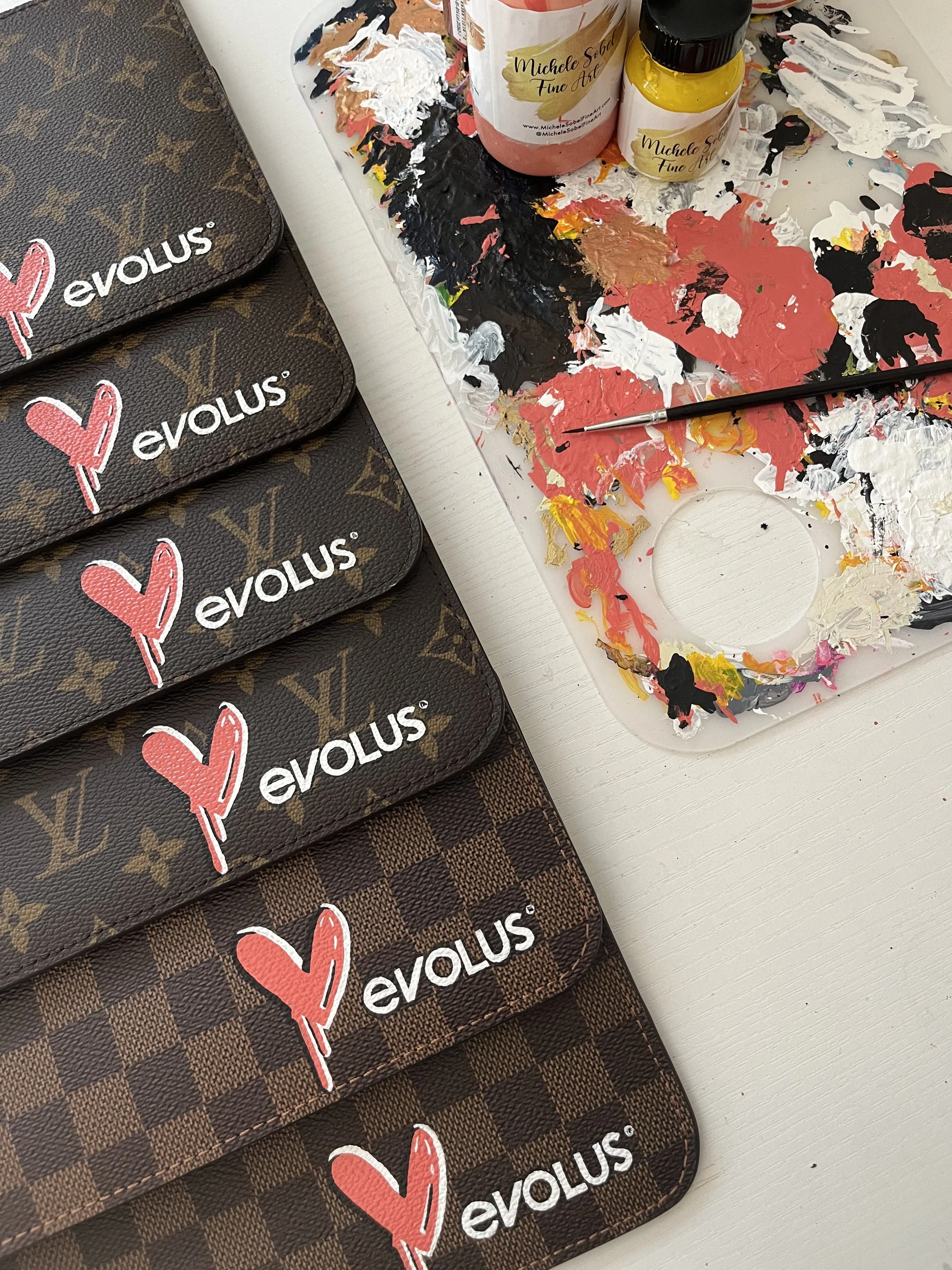 VIP gifting for Evolus. Corporate Gifts and Incentive gifts painted by Michele Sobel Fine Art