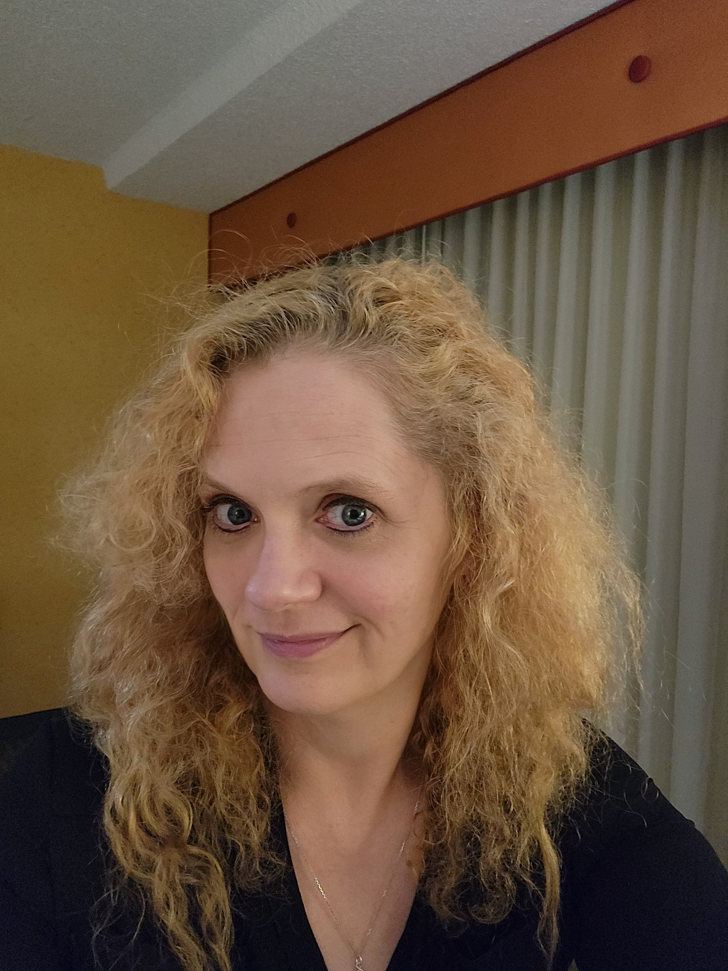 It's a picture of me in all my curly blonde glory