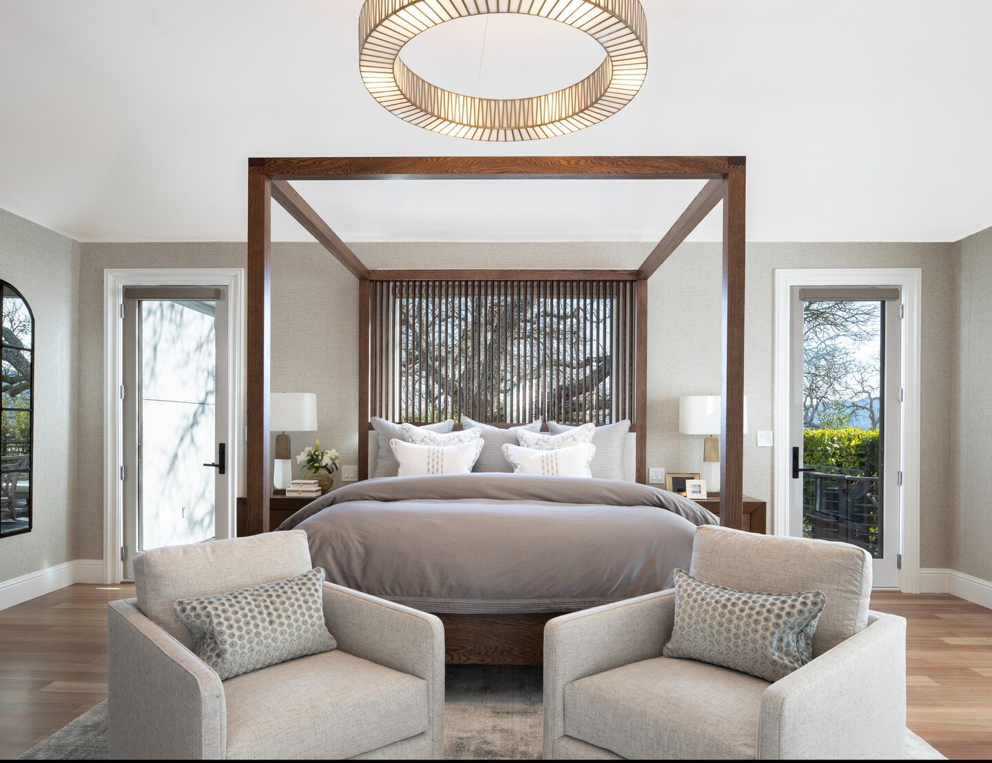 What to do when the Primary Suite has no bed wall...? We love how the bed frame lets just enough view through to show off this majestic oak.
.
.
#primarybedroom #mastersuite #canopybed #neutralinteriors #restfulbedroom #homerenovation #houseonahill #