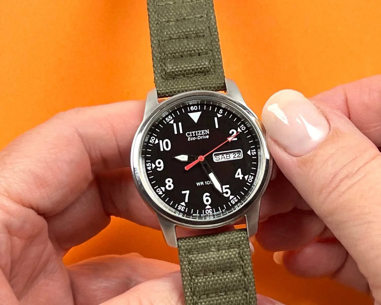Stopped Citizen Eco-Drive watch showing incorrect time, requiring diagnosis and repair.