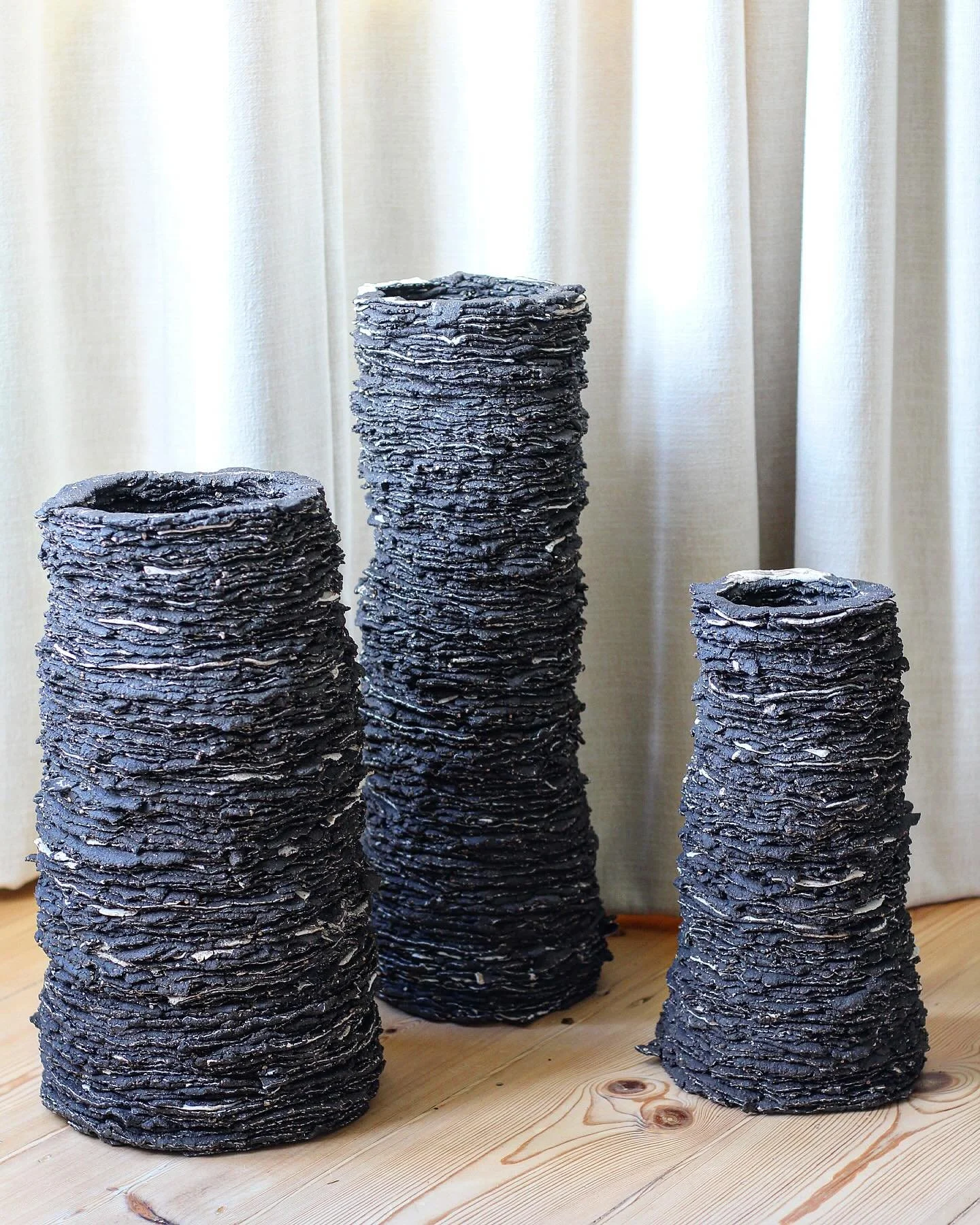 The Ash Forest is growing, as the Ash trees come into leaf. Watching to see how many more have succumbed to Ash dieback this year. #ceramicsculpture #sculpture #monuments #pottery #ceramics #blackclay #porcelain #ashtrees #ashdieback #ashdiebackaware