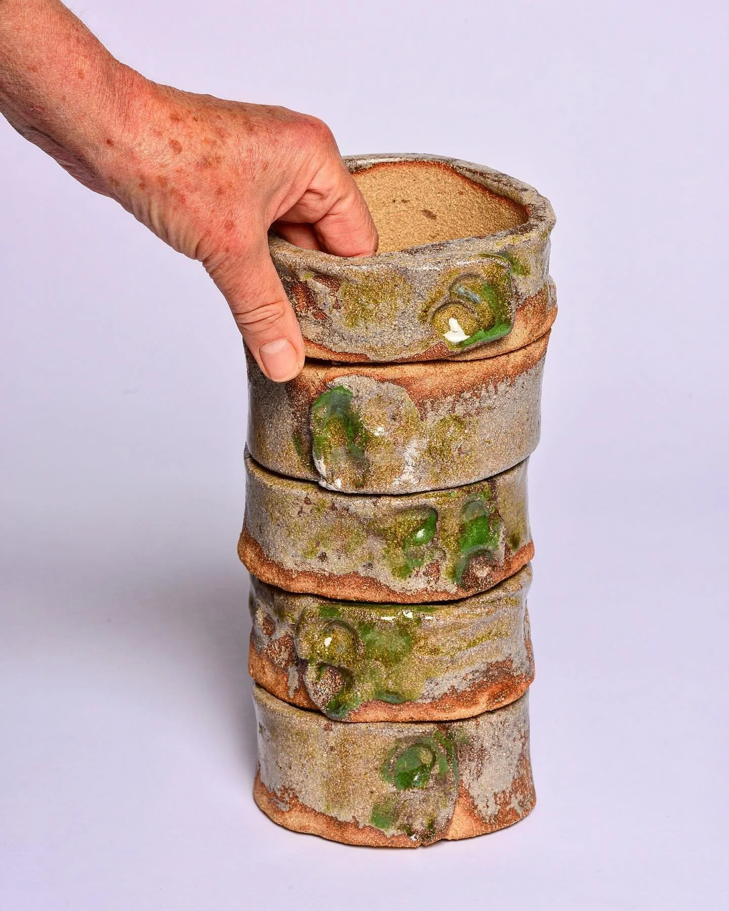 Ash wood glazed ceramic rings, each one unique, like the rings of an Ash tree, part of my study into Ash dieback. photographed by @ellie.spink @bathspauni @mafabathspa #ceramics #ashdieback #ashglaze #ceramicsculpture #mafabathspa #bathspauniversity