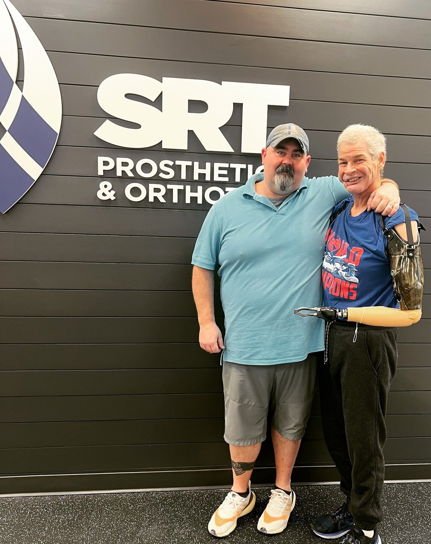 Trinity (SRT's upper extremity lab tech) usually blends in with the crowd, but on this day he and Corbin shined bright showing off this new custom camo socket! 

Corbin came to us in 2023 after a complication from cancer caused him to lose his arm. T