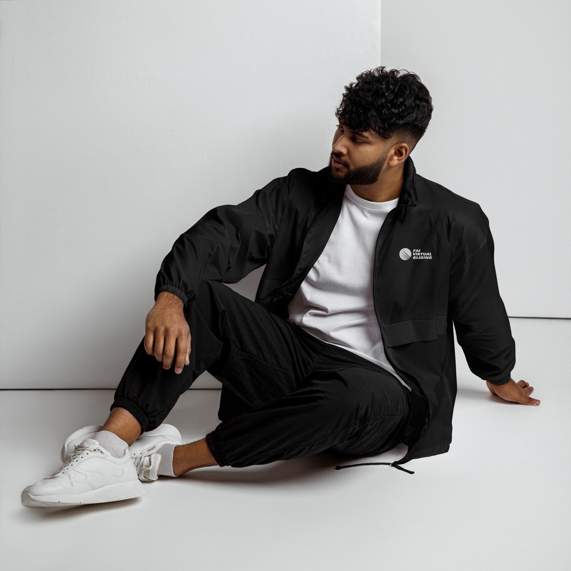 basic-unisex-windbreaker-black-front-67c6c72126180.jpg
