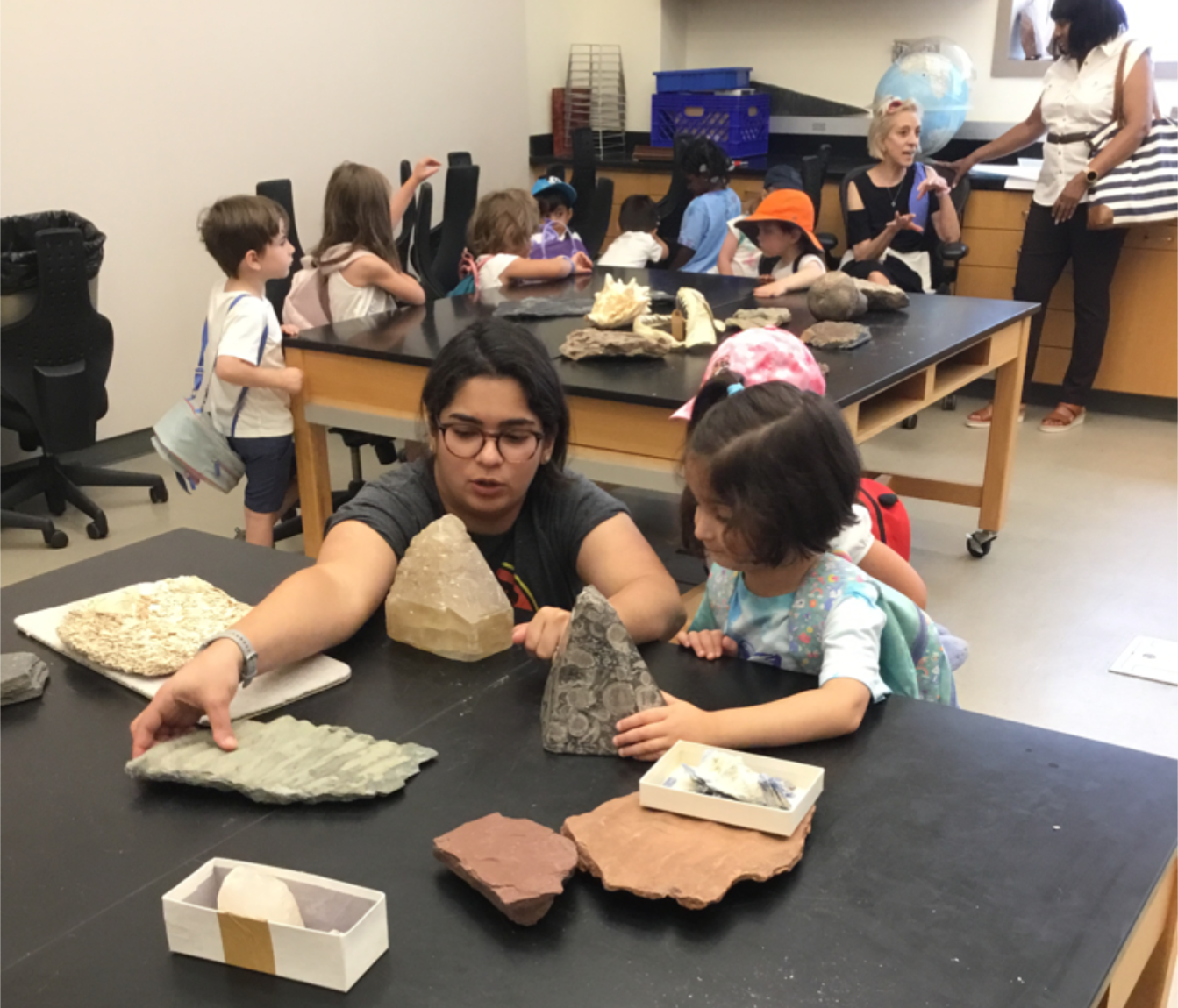 Introducing pre-school summer camp students to various kinds of rocks (June 2024)