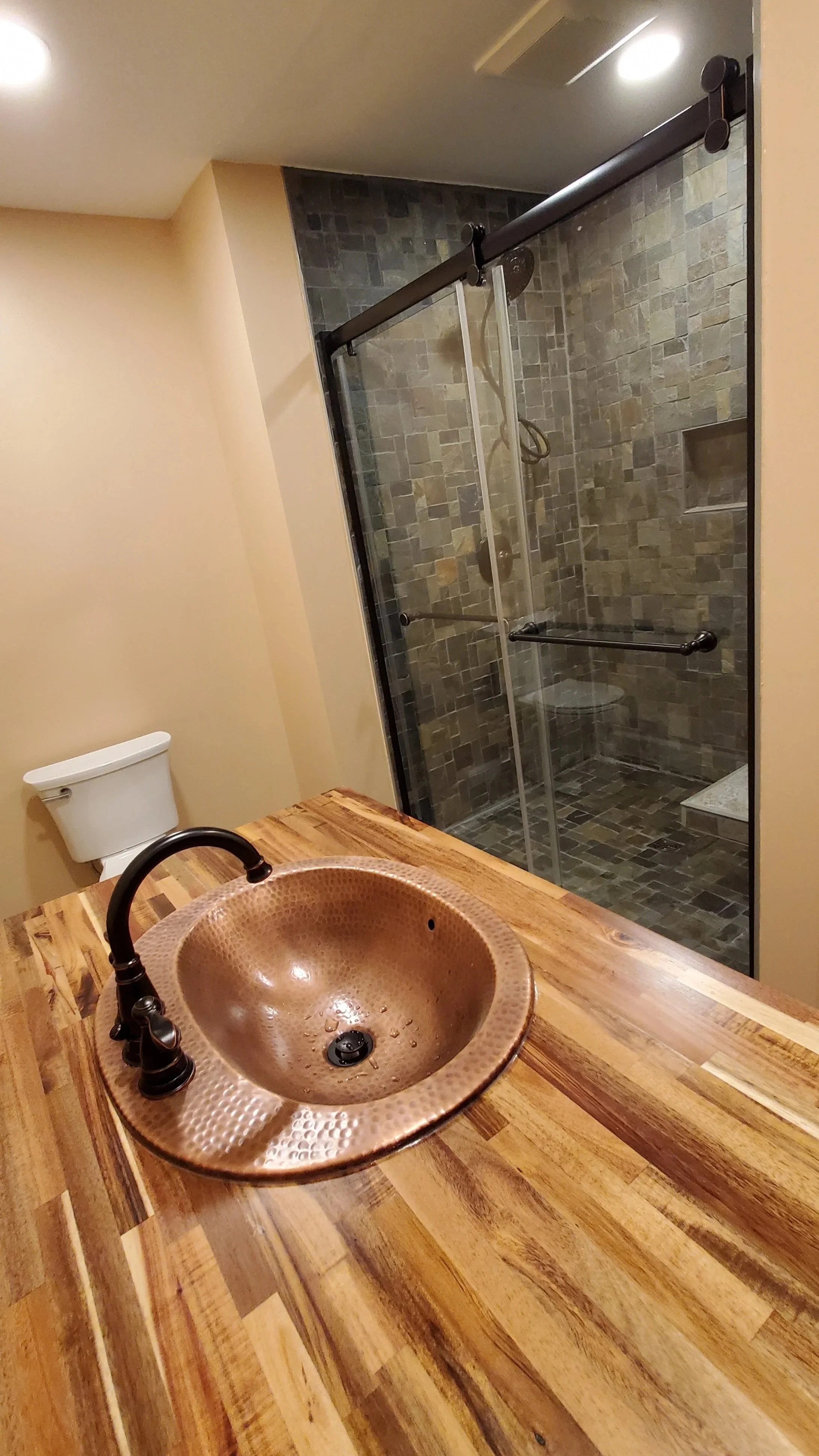 Basement bathroom in East TN showing vanity top and shower