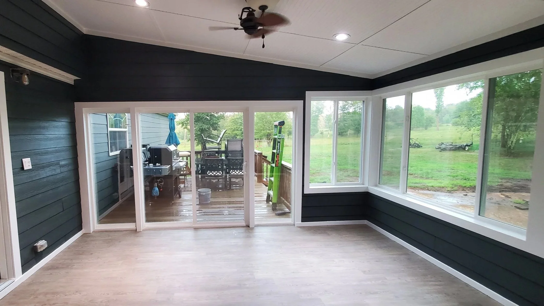 Porchi conversion in Dayton, TN, showing new sliding doors and finished ceiling