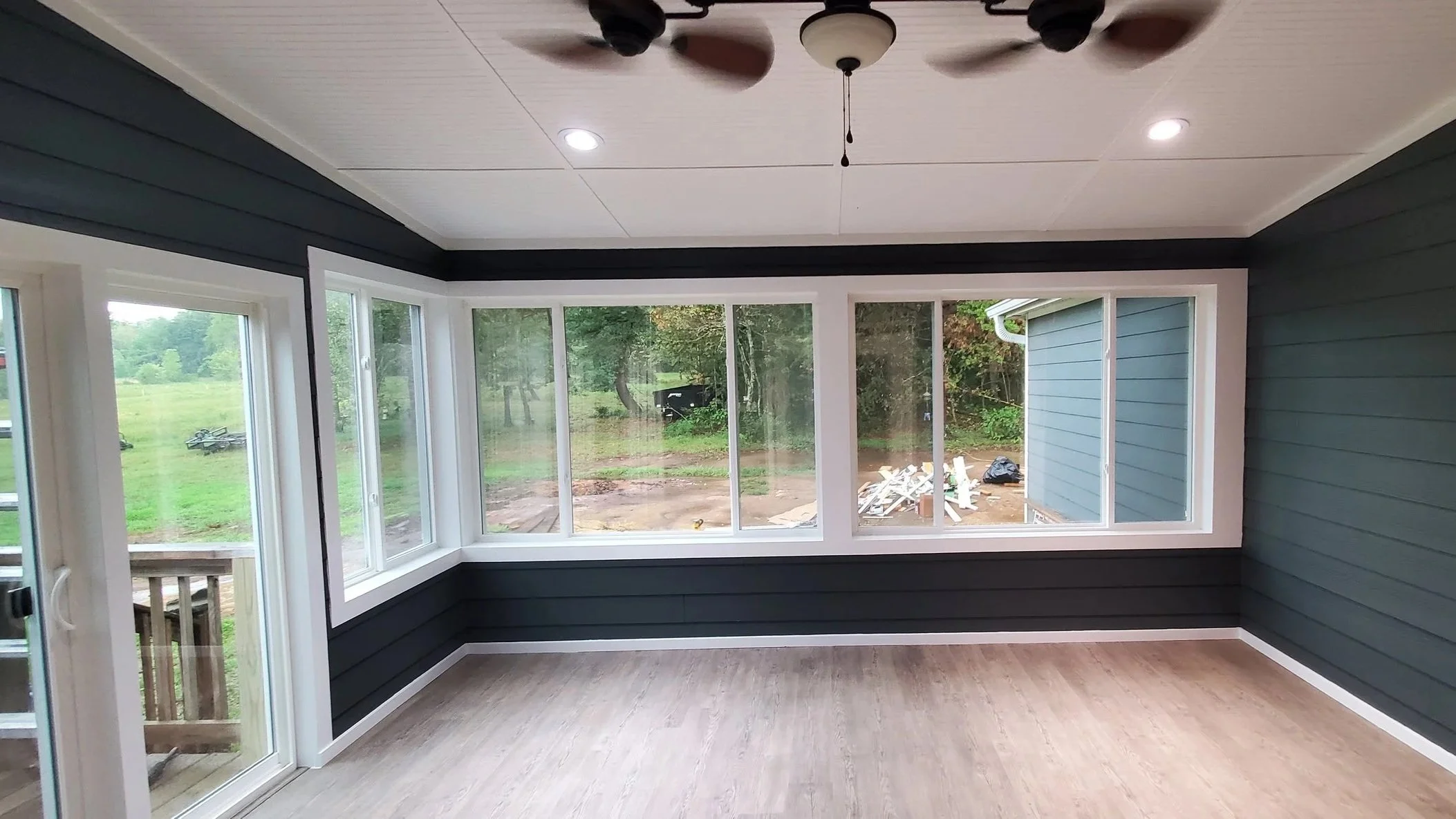 Porch conversion in Dayton, TN, showing new windows