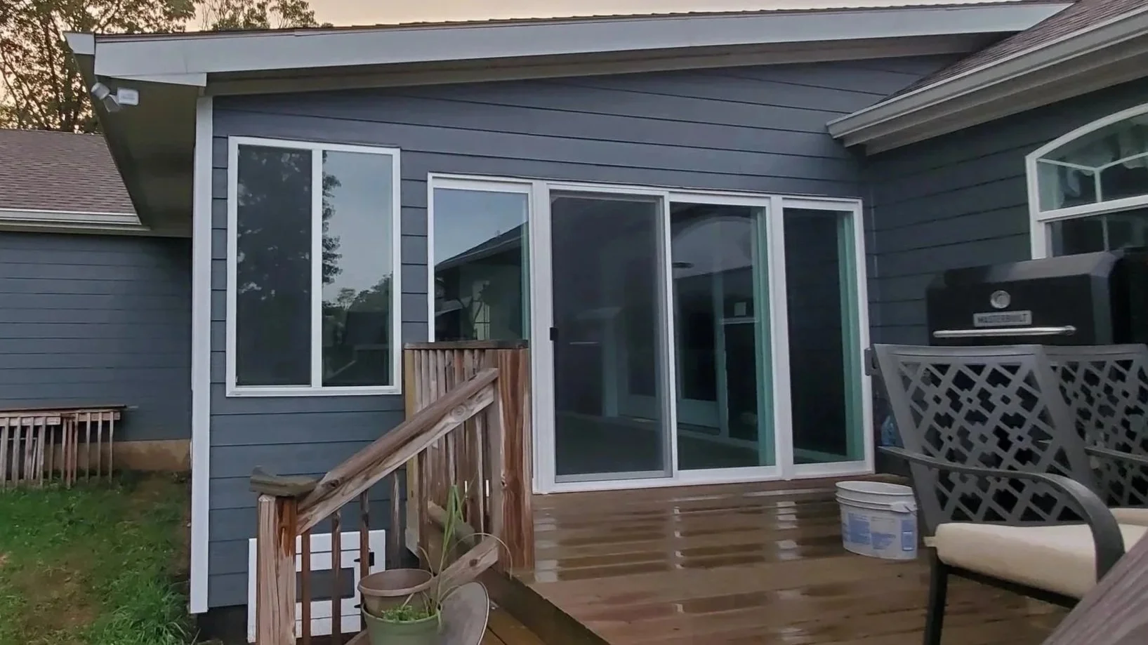 Porch conversion in Dayton, TN showing finished side with windw and sliding doors