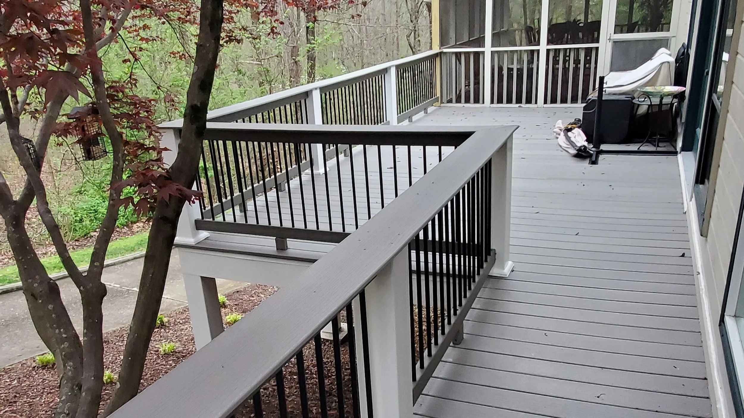 Deck rebuild in McDonald, TN showing composite rails and decking from above