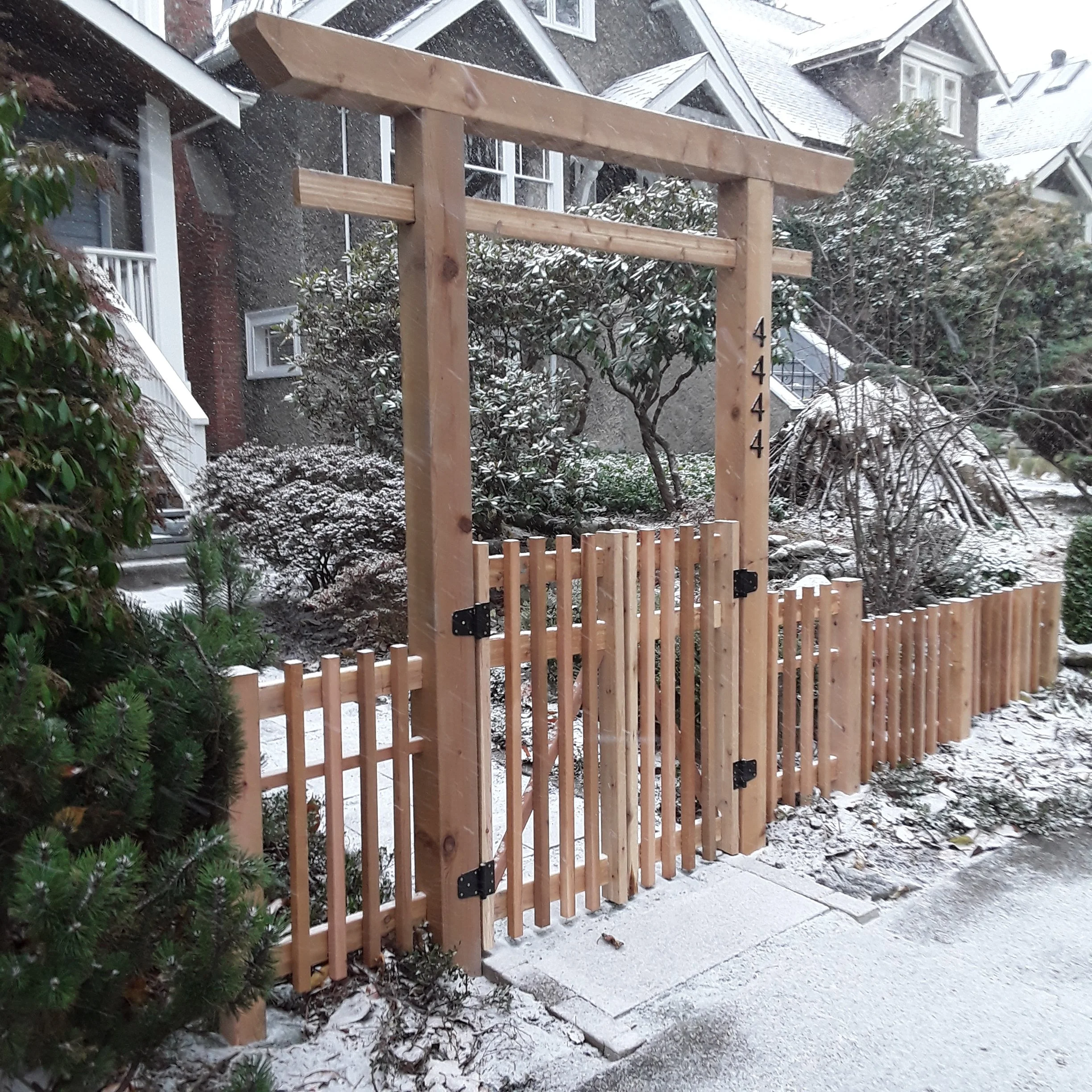 New gate and fence, view from sidewalk