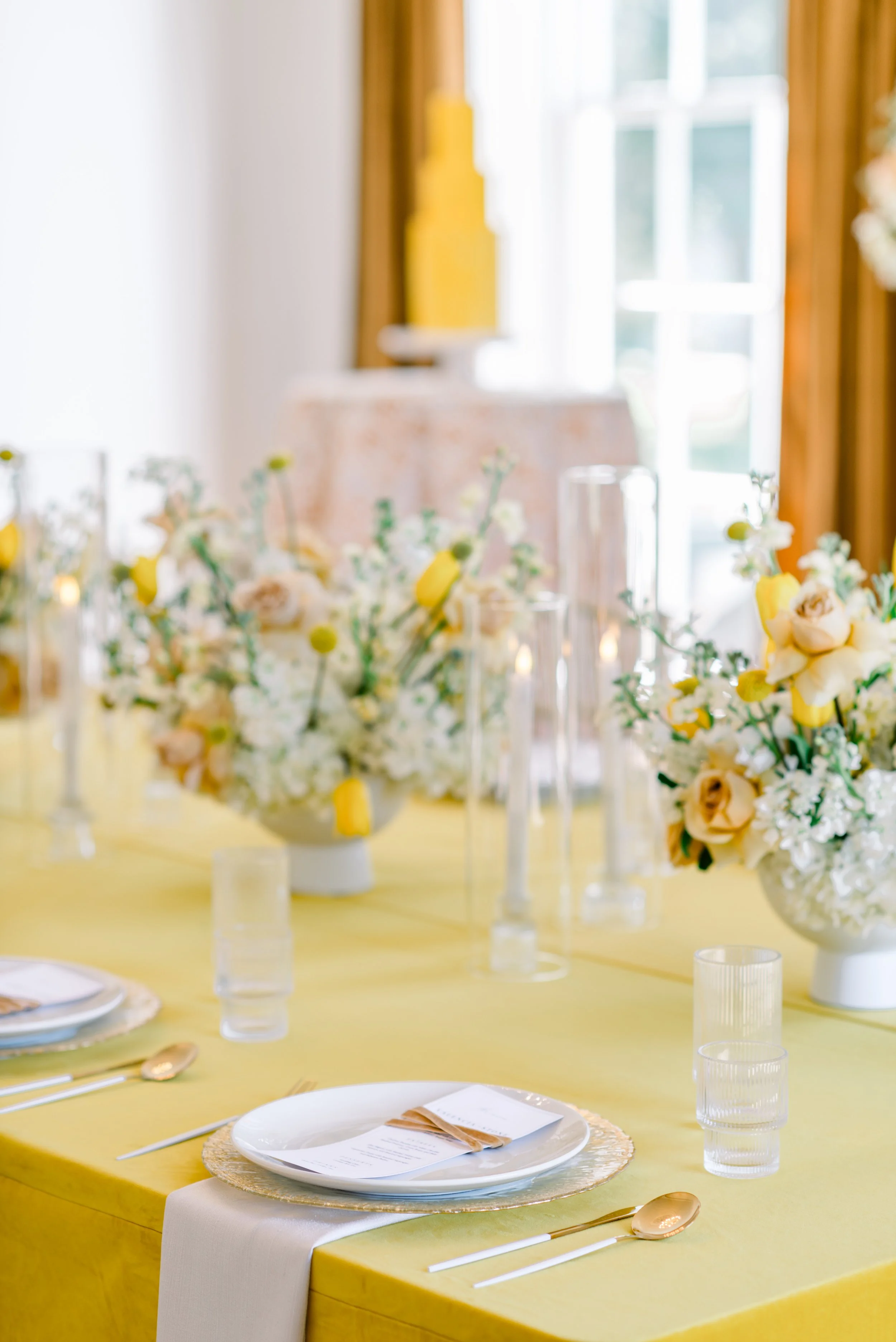 wedding reception flowers white and mustard