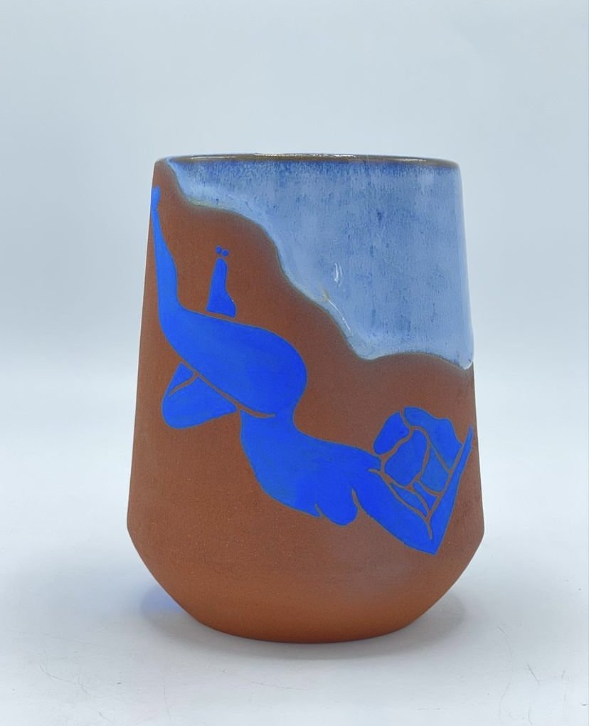 Left: Matisse's influence is clear in an electric-blue female figure on terracotta. 