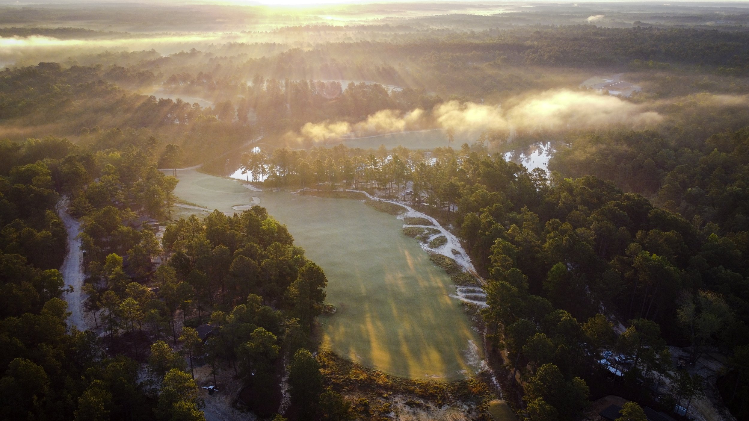 An aerial view of one of Dormie Club’s courses in the morning.